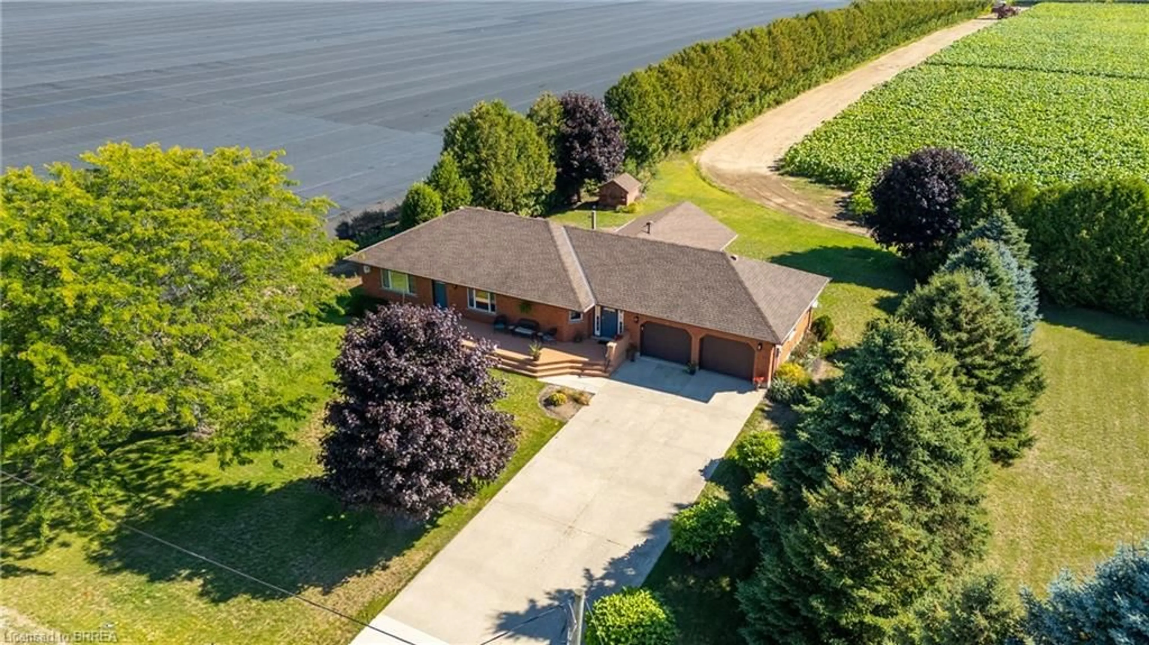 A pic from outside/outdoor area/front of a property/back of a property/a pic from drone, water/lake/river/ocean view for 3168 Swimming Pool Rd, La Salette Ontario N0E 1H0