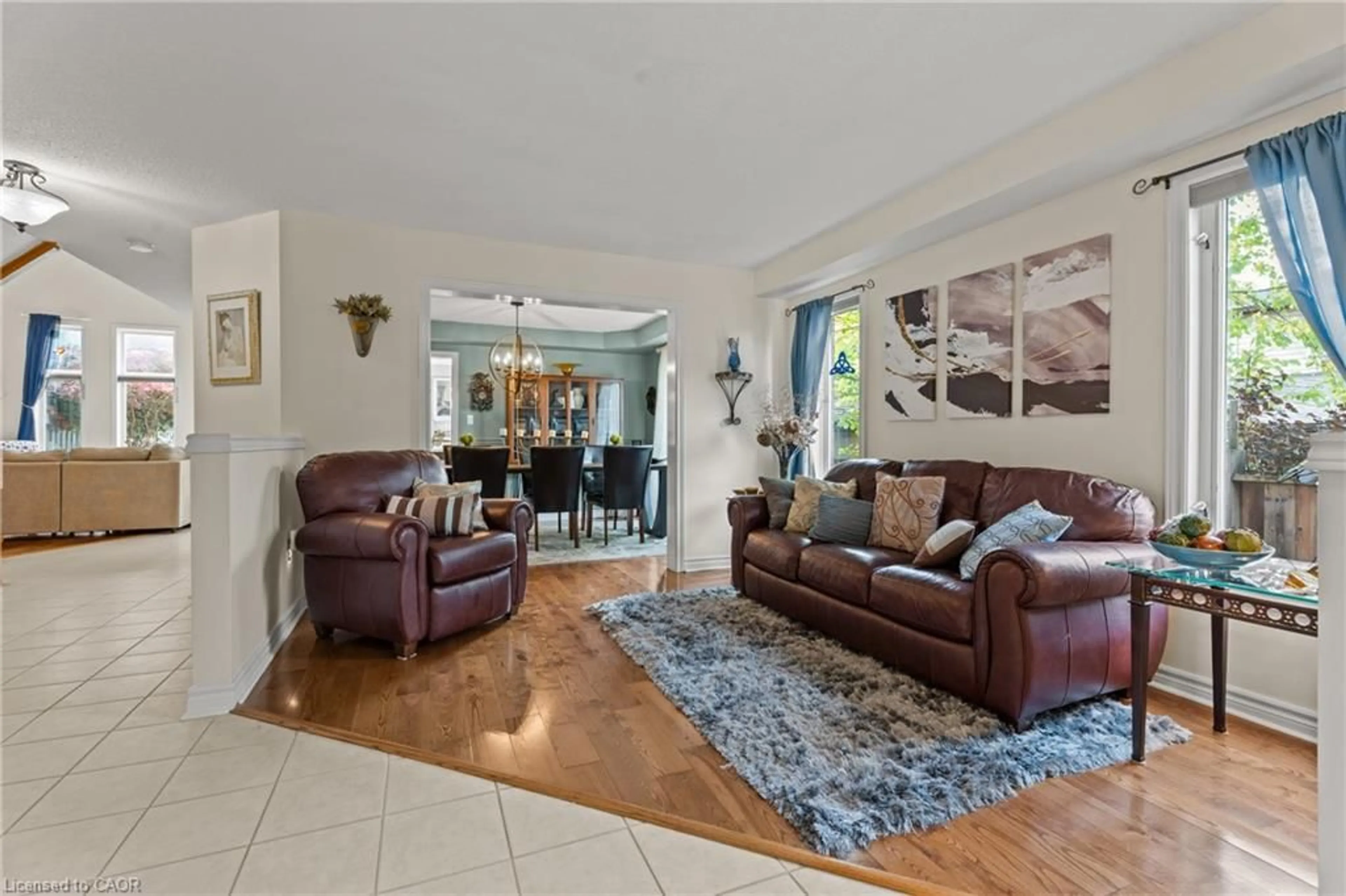 Living room with furniture, ceramic/tile floor for 251 Hawkswood Trail, Hamilton Ontario L9B 2T1
