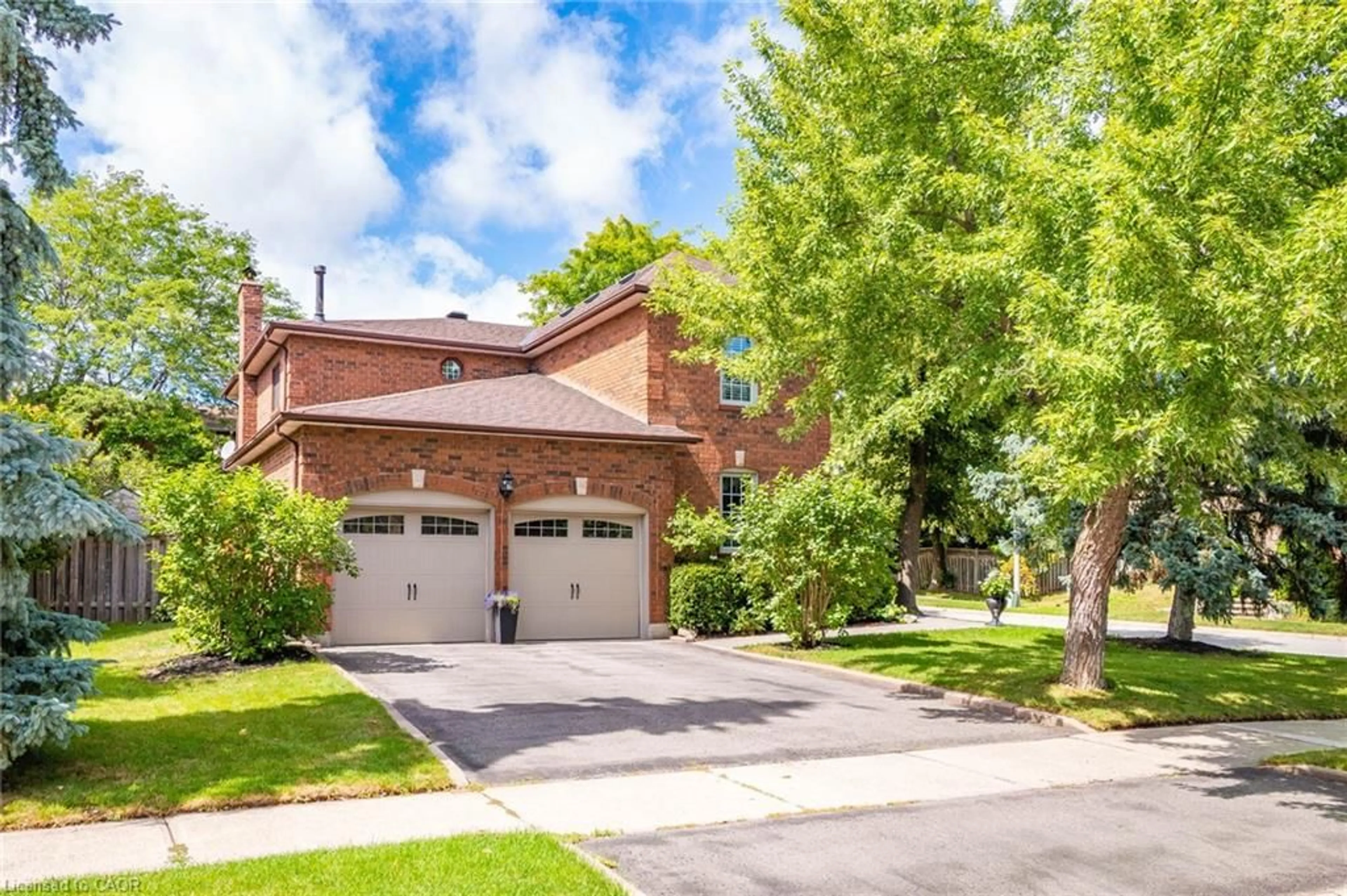 Home with brick exterior material, street for 1436 Sprucewood Terr, Oakville Ontario L6M 2P9
