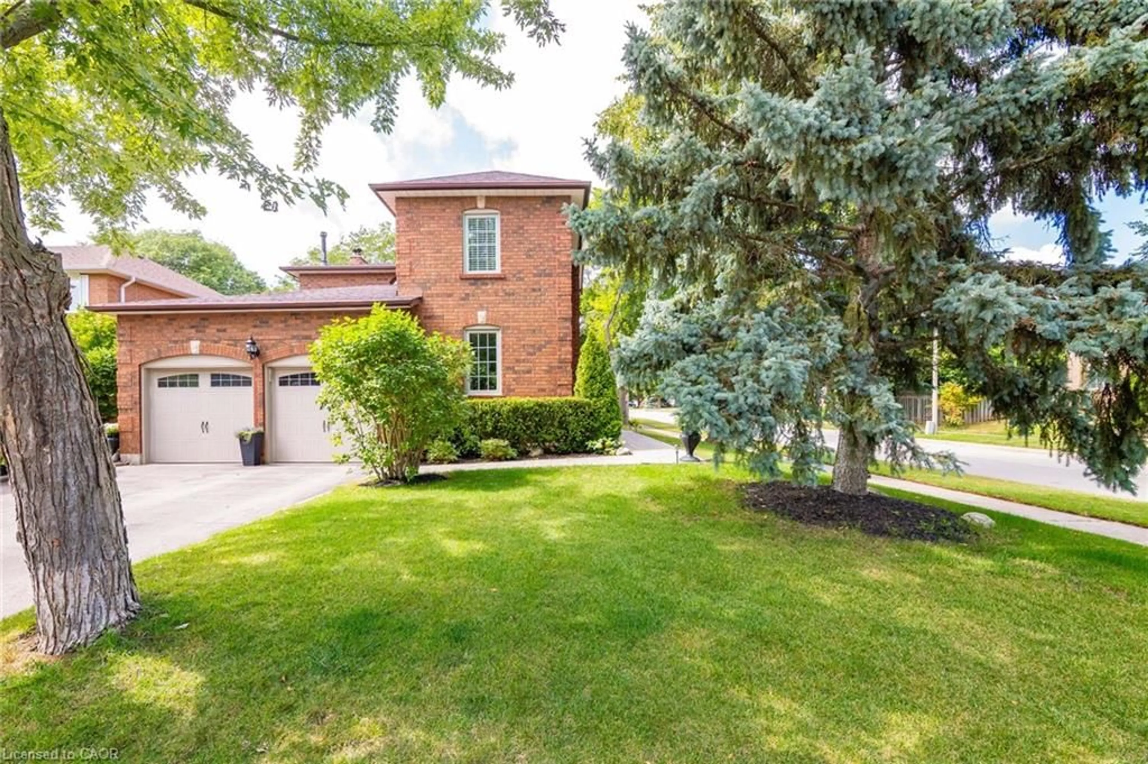 Home with brick exterior material, street for 1436 Sprucewood Terr, Oakville Ontario L6M 2P9