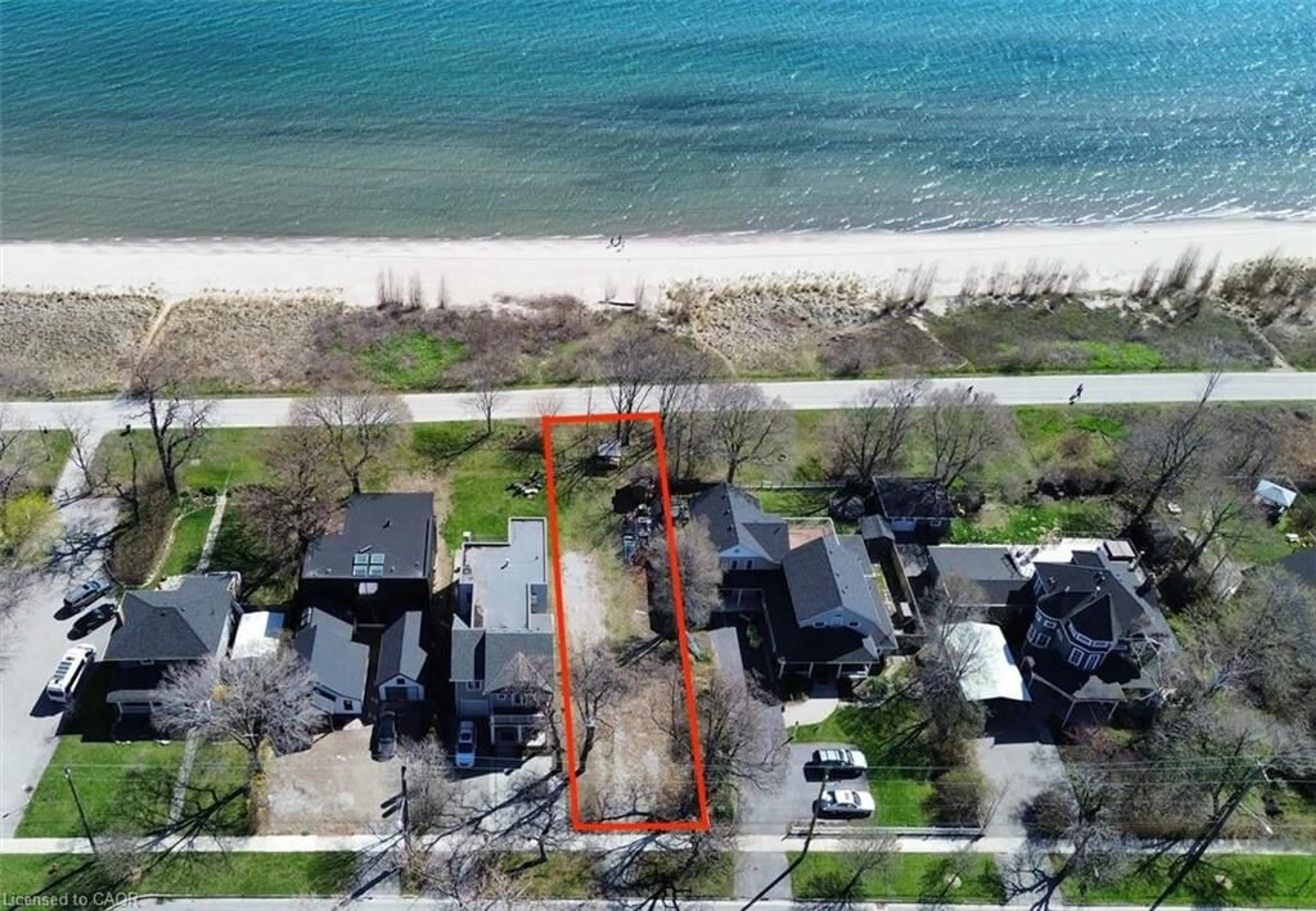 A pic from outside/outdoor area/front of a property/back of a property/a pic from drone, water/lake/river/ocean view for 971 Beach Blvd, Hamilton Ontario L8H 6Z7