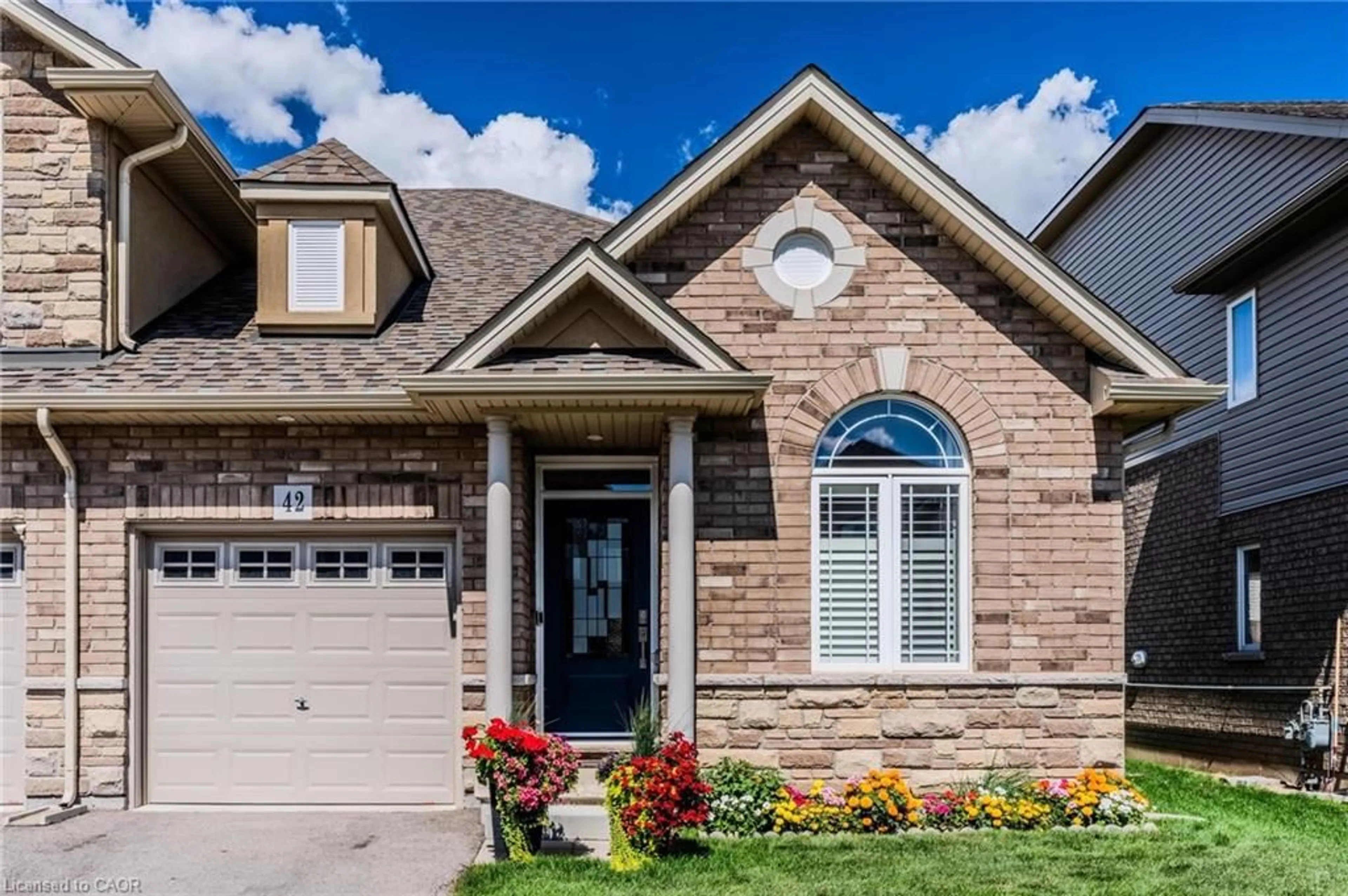 Home with brick exterior material, street for 42 Cittadella Blvd, Hamilton Ontario L0R 1P0