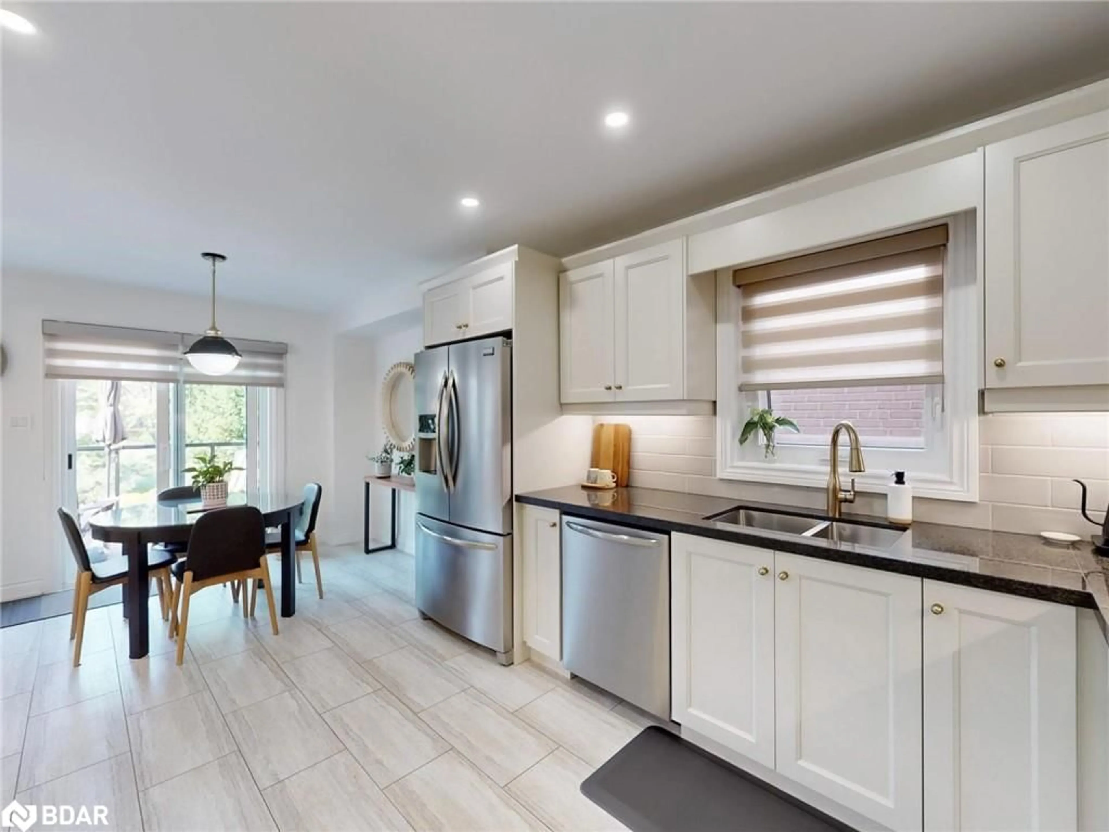 Open concept kitchen, ceramic/tile floor for 184 Mowat Cres, Georgetown Ontario L7G 6A4