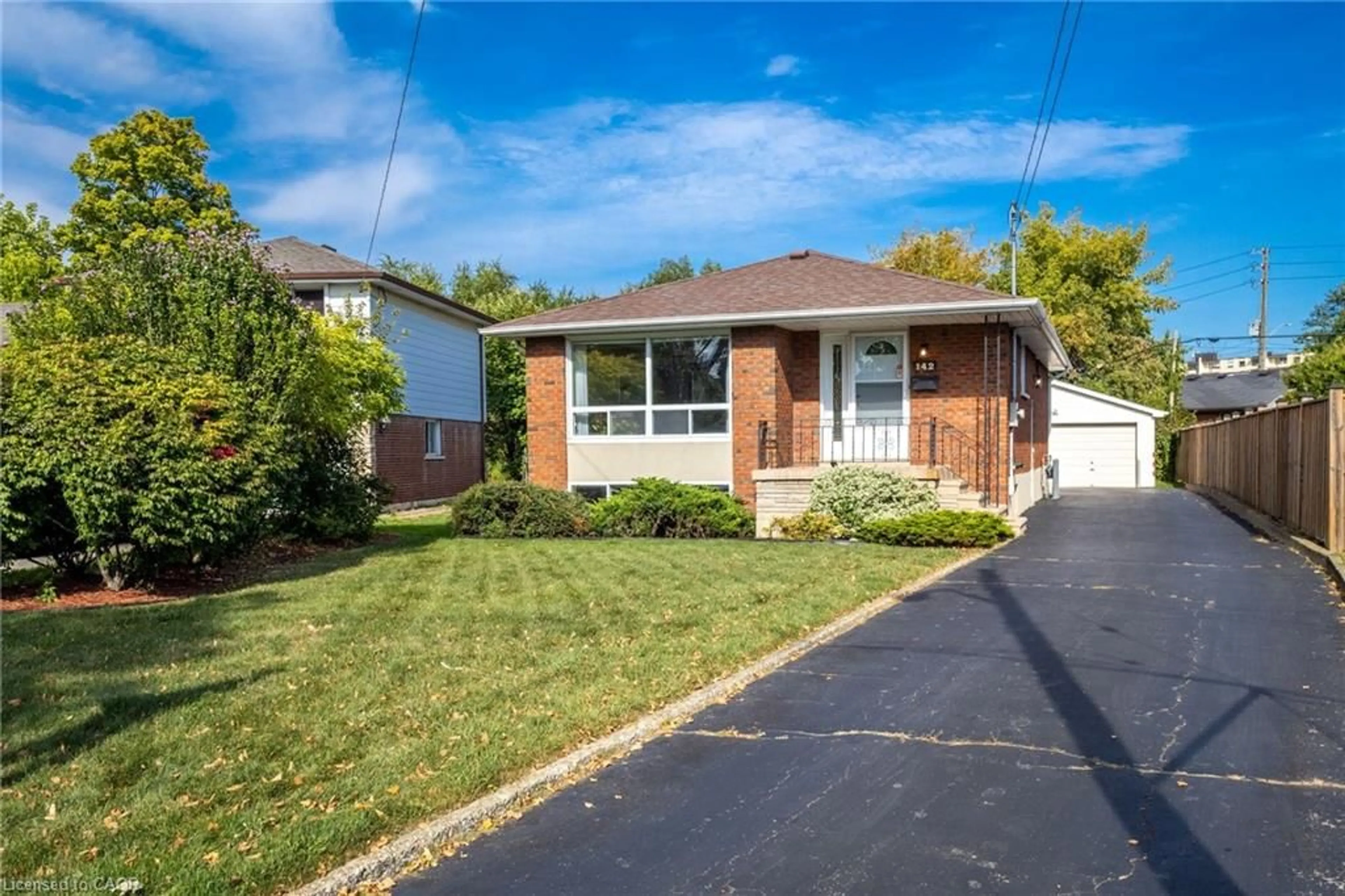 Home with brick exterior material, street for 142 Fernwood Cres, Hamilton Ontario L8T 3L4