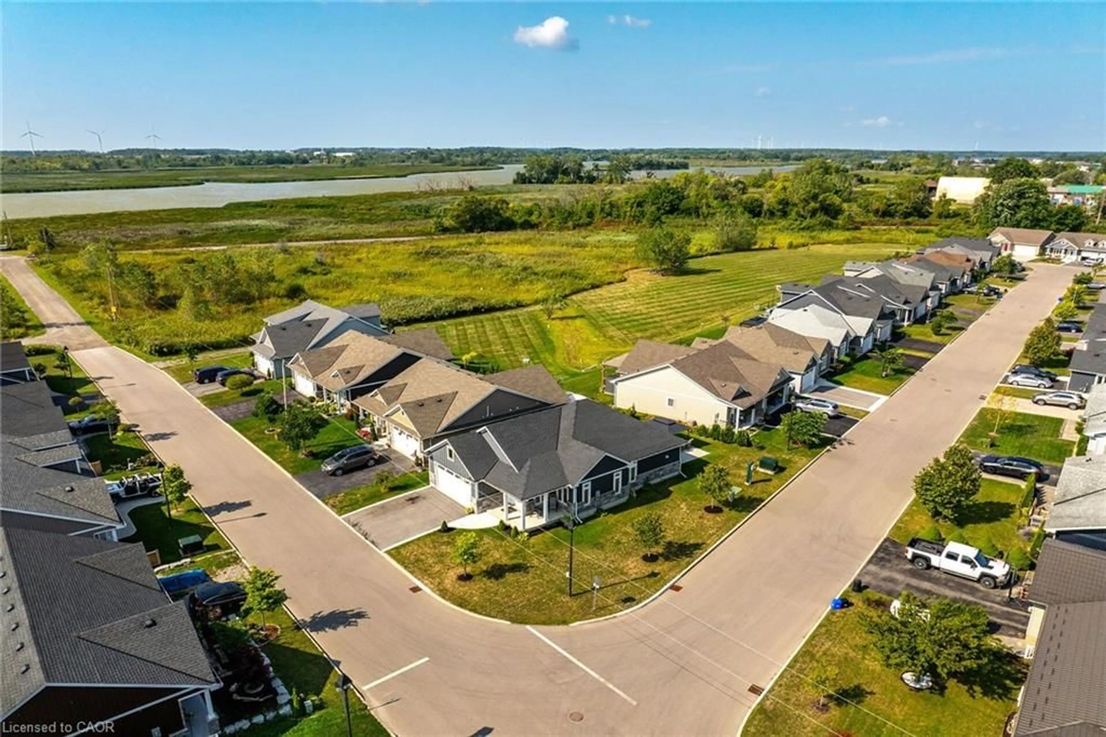 A pic from outside/outdoor area/front of a property/back of a property/a pic from drone, water/lake/river/ocean view for 740 Main St #24, Dunnville Ontario N1A 0B3