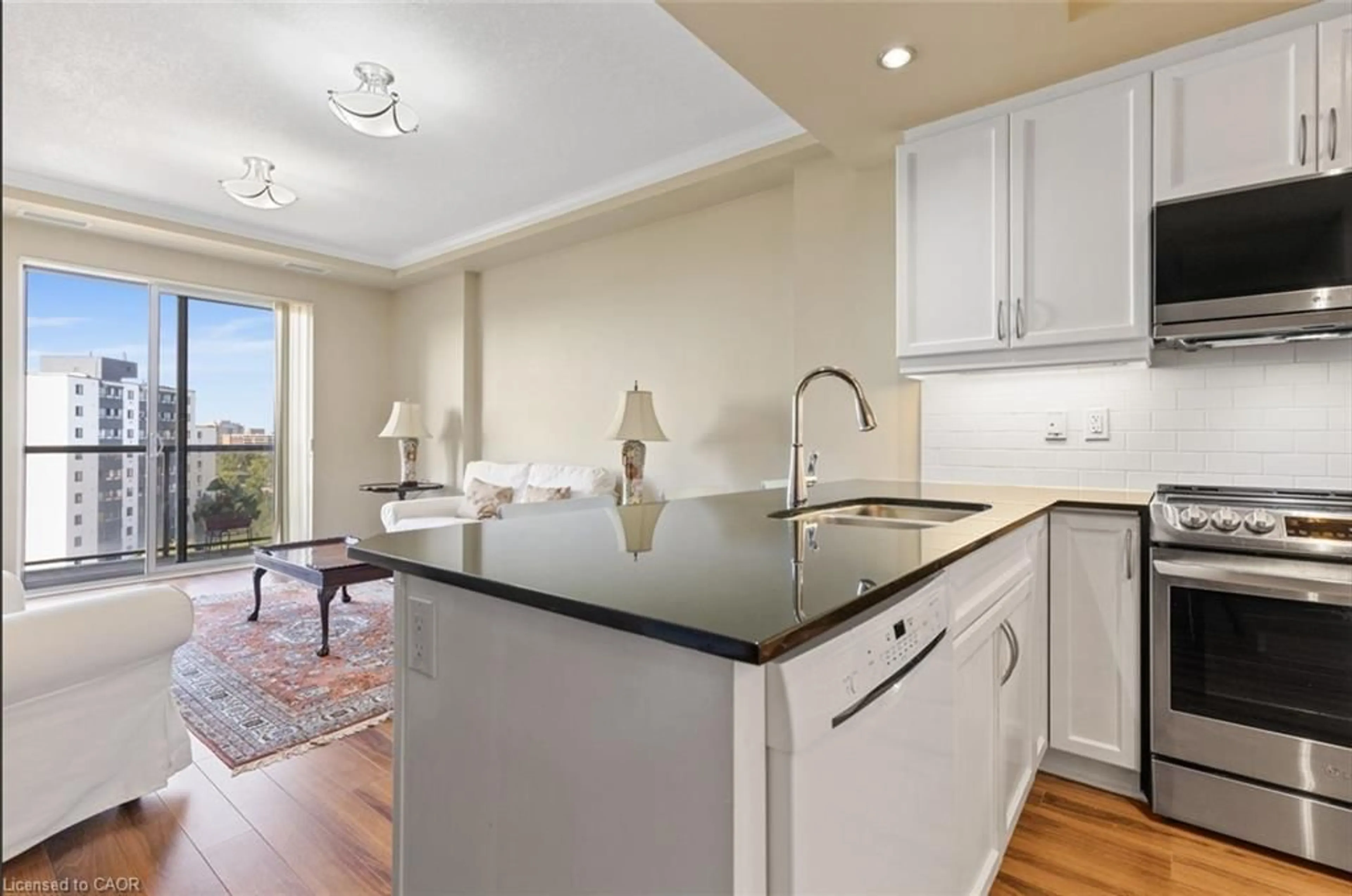 Open concept kitchen, ceramic/tile floor for 539 Belmont Ave #906, Kitchener Ontario N2M 0A2