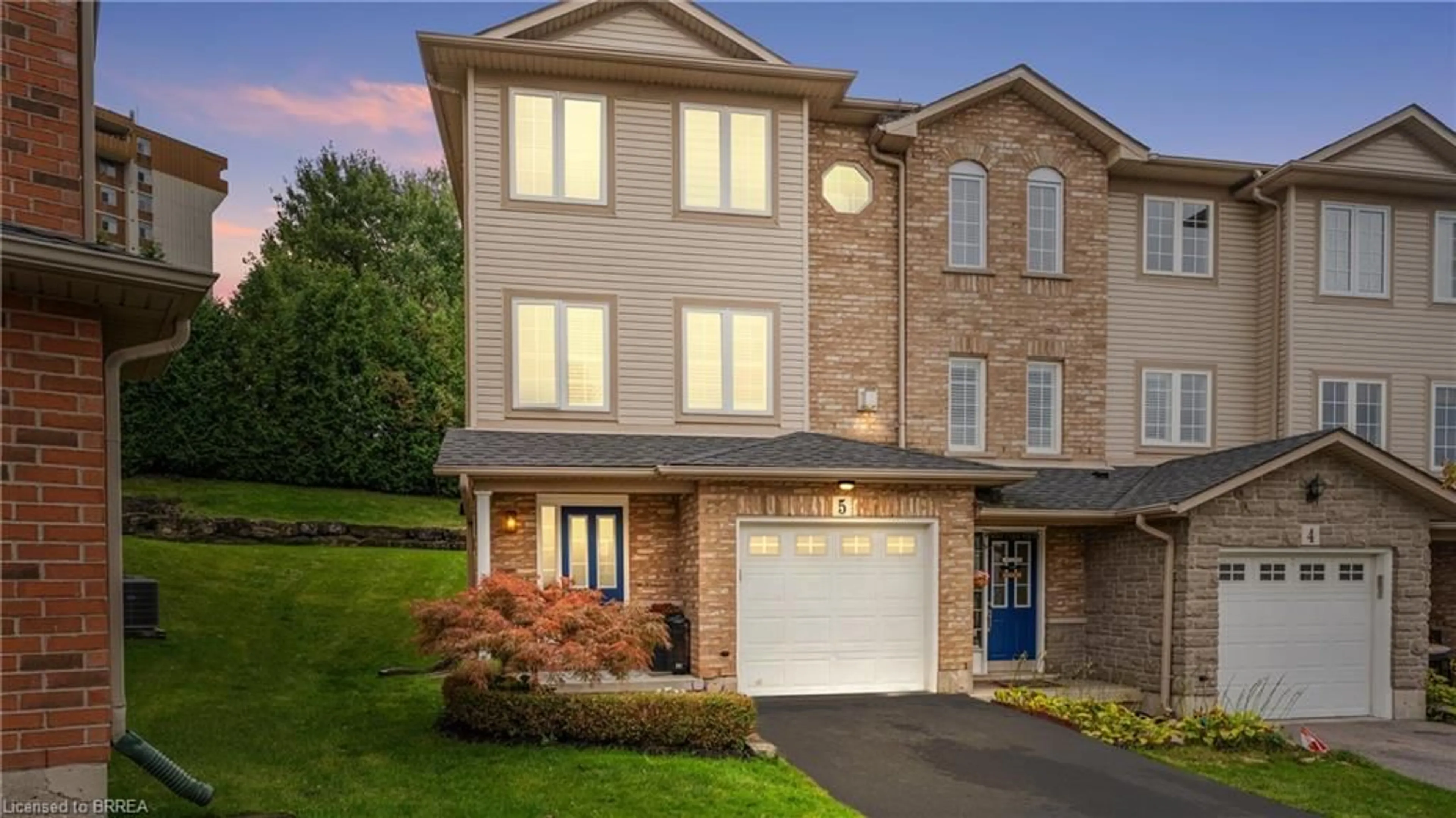 Home with brick exterior material, street for 7 Southside Pl #5, Hamilton Ontario L9C 7W6
