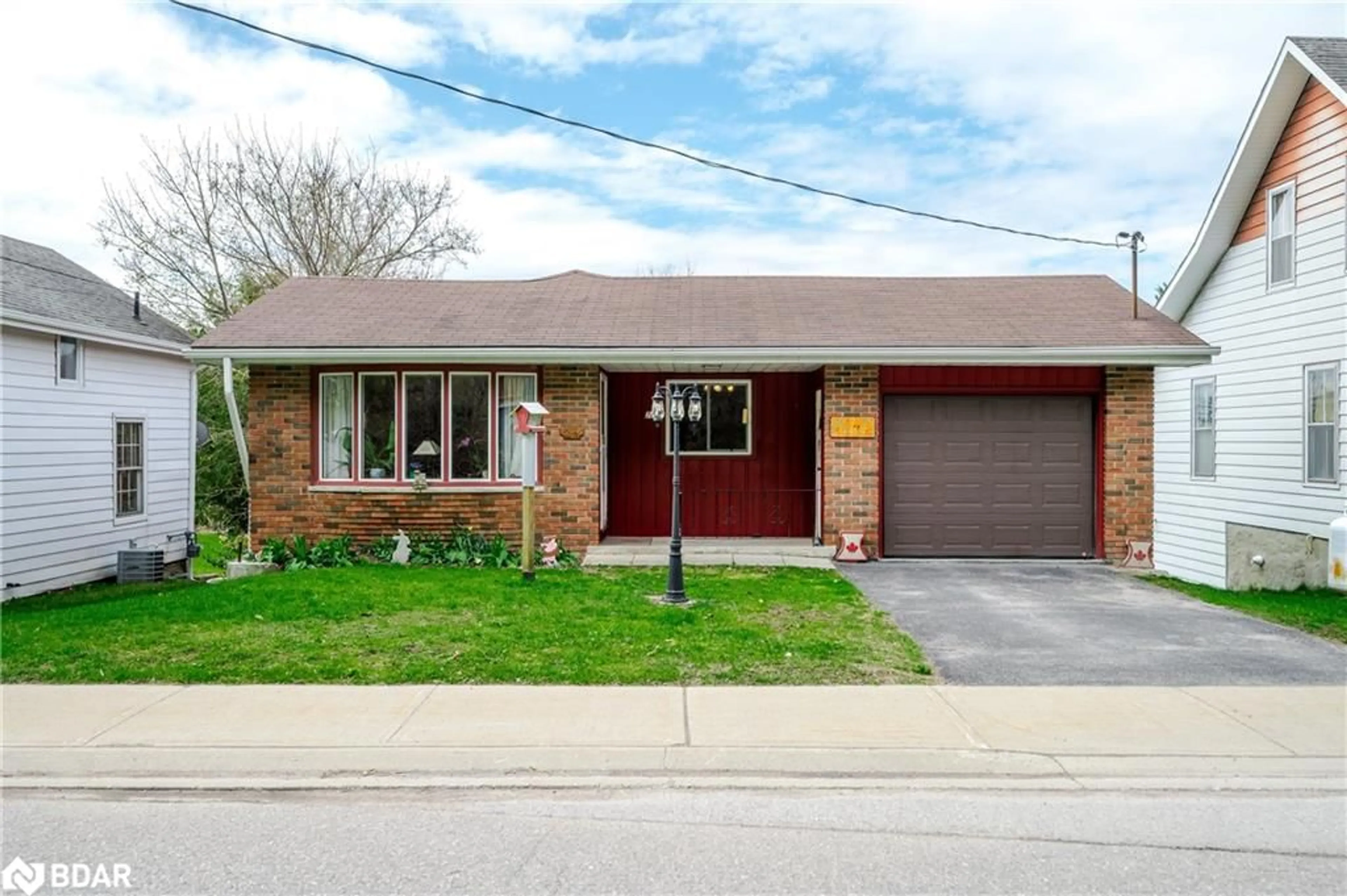 Home with brick exterior material, street for 28 Bond St, Fenelon Falls Ontario K0M 1N0