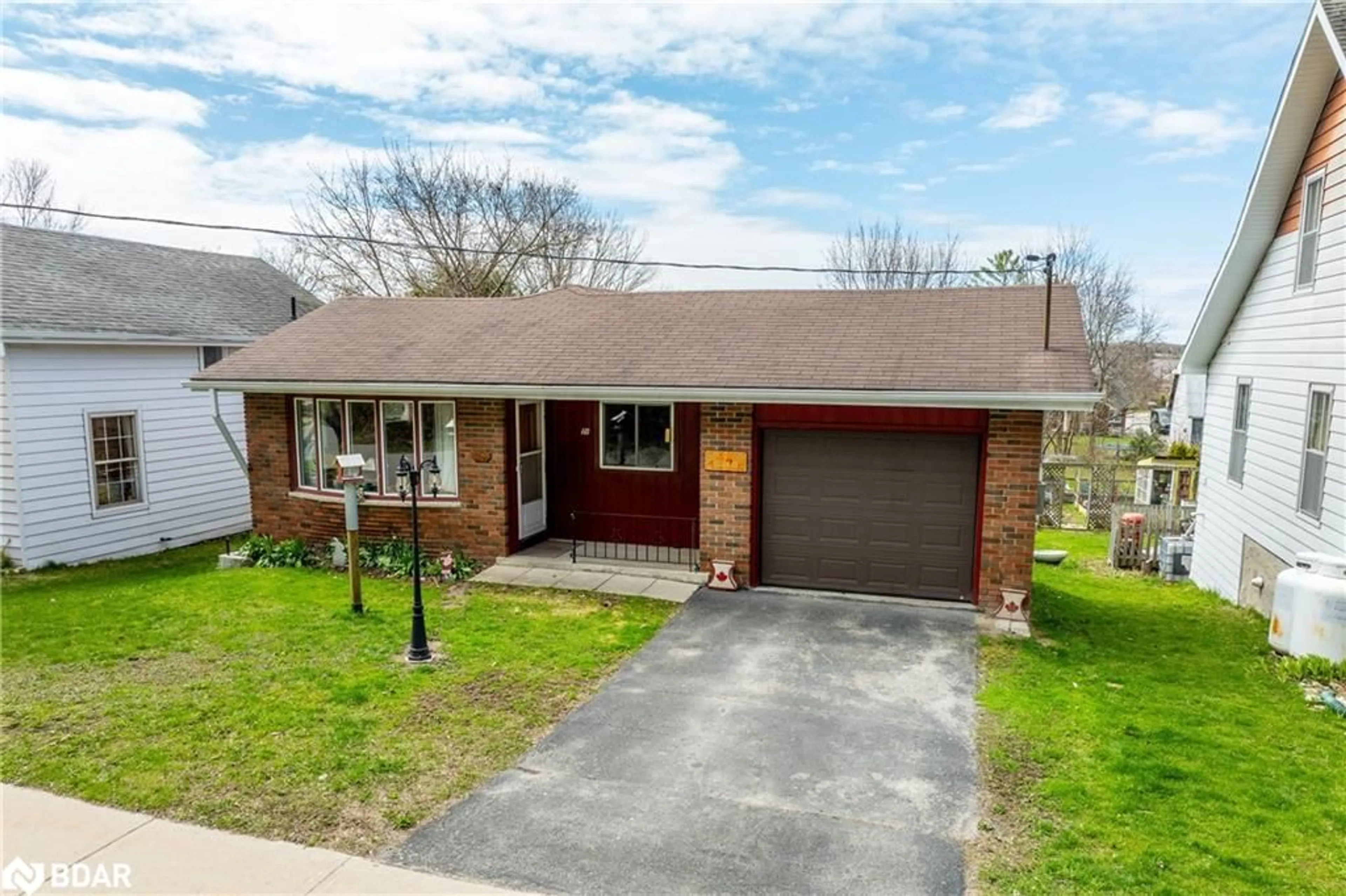 Home with brick exterior material, street for 28 Bond St, Fenelon Falls Ontario K0M 1N0