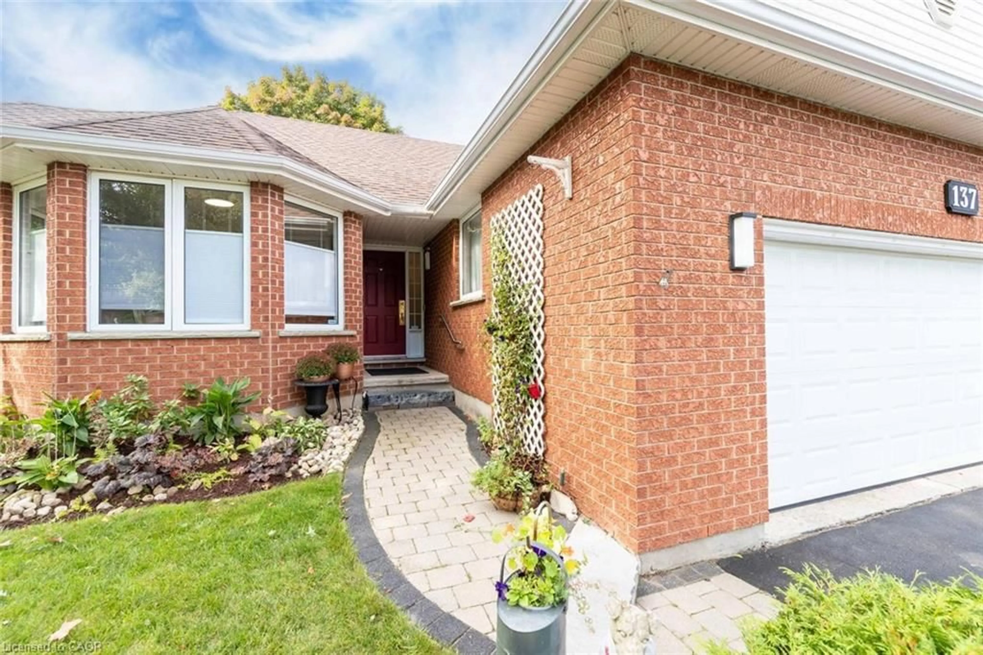 Home with brick exterior material, street for 137 Lou's Blvd, Rockwood Ontario N0B 2K0