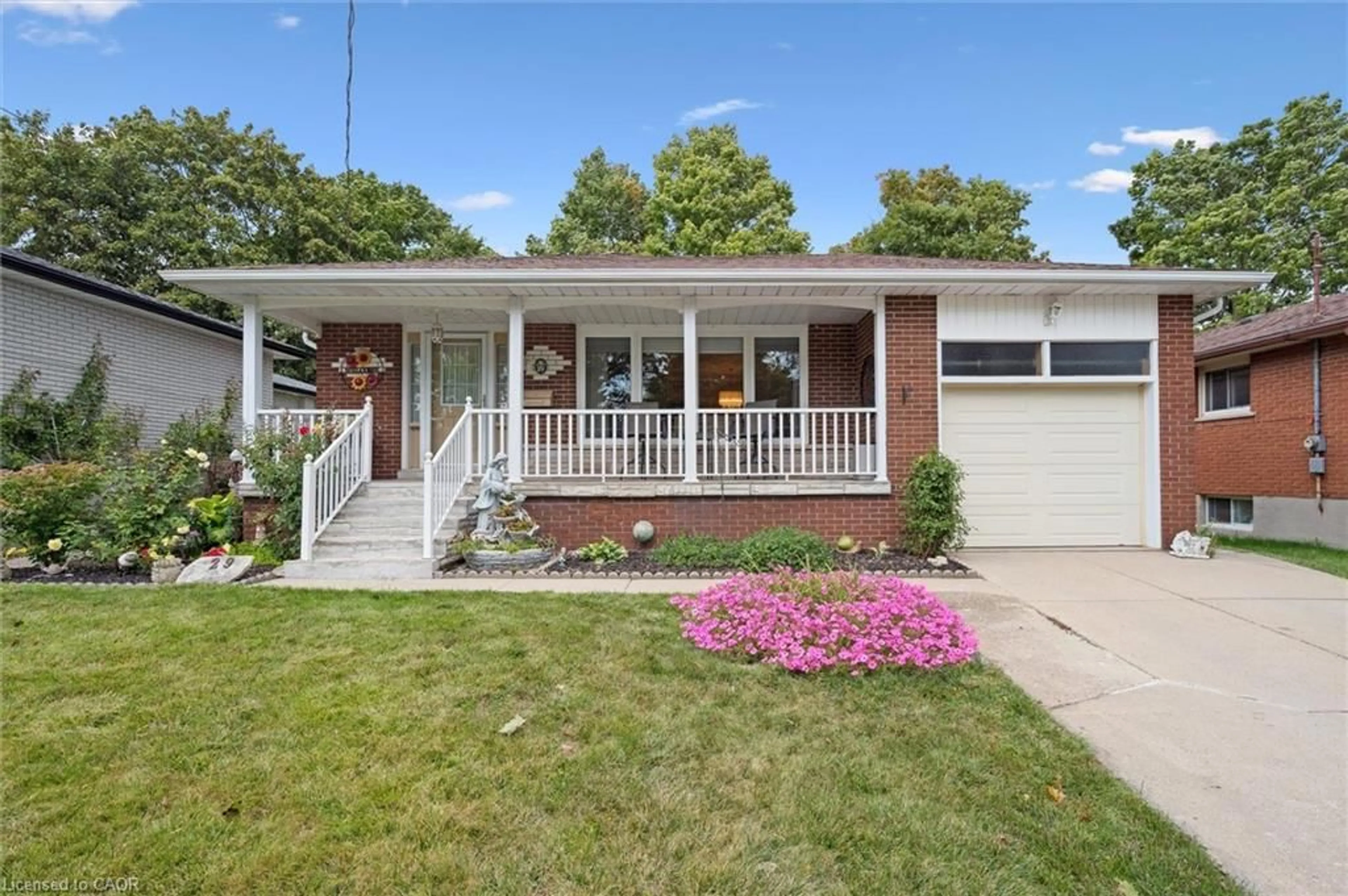 Home with vinyl exterior material, street for 29 Algoma Dr, Guelph Ontario N1E 1C8