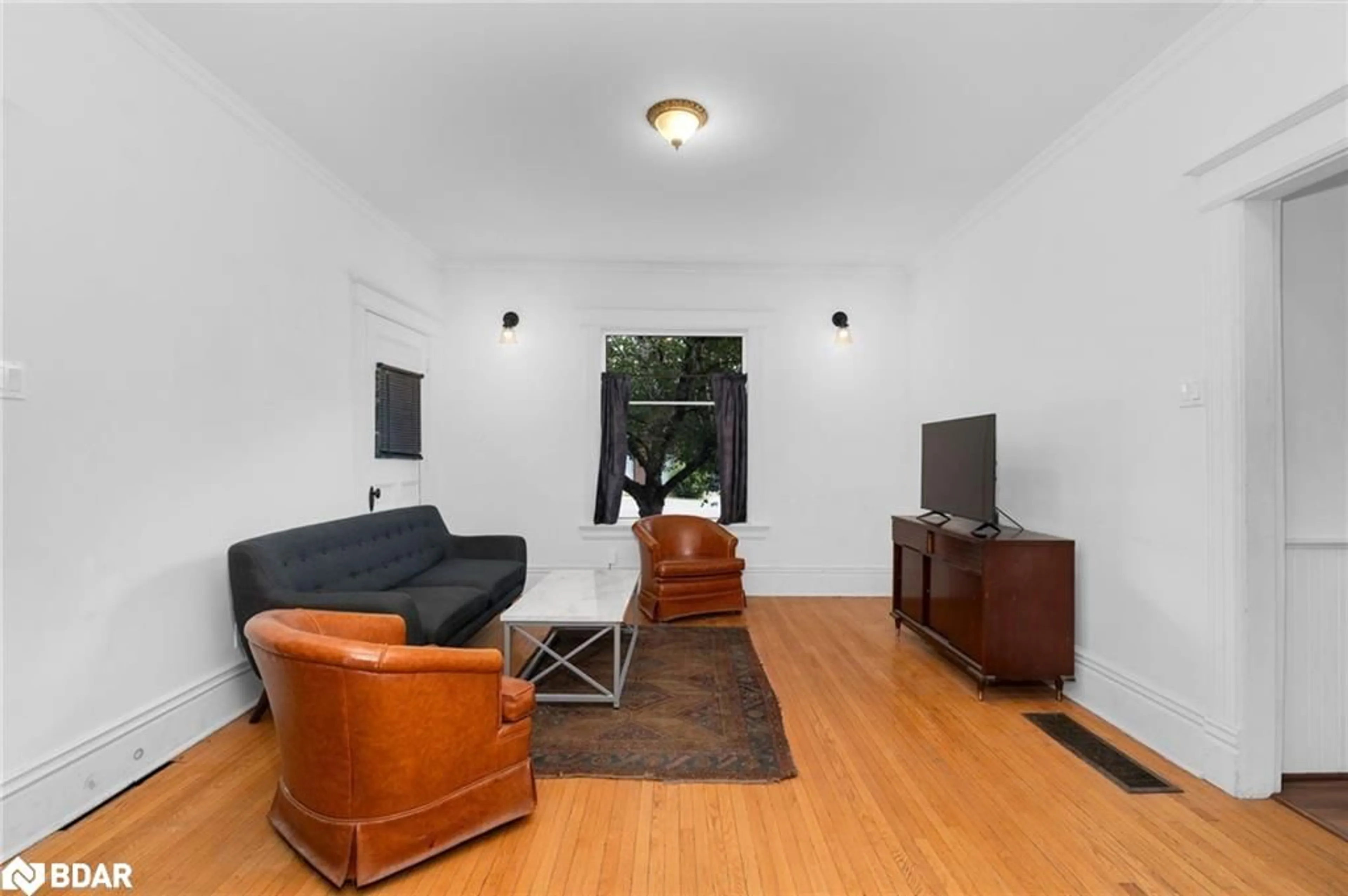 Living room with furniture, unknown for 134 Owen St, Barrie Ontario L4M 3H9