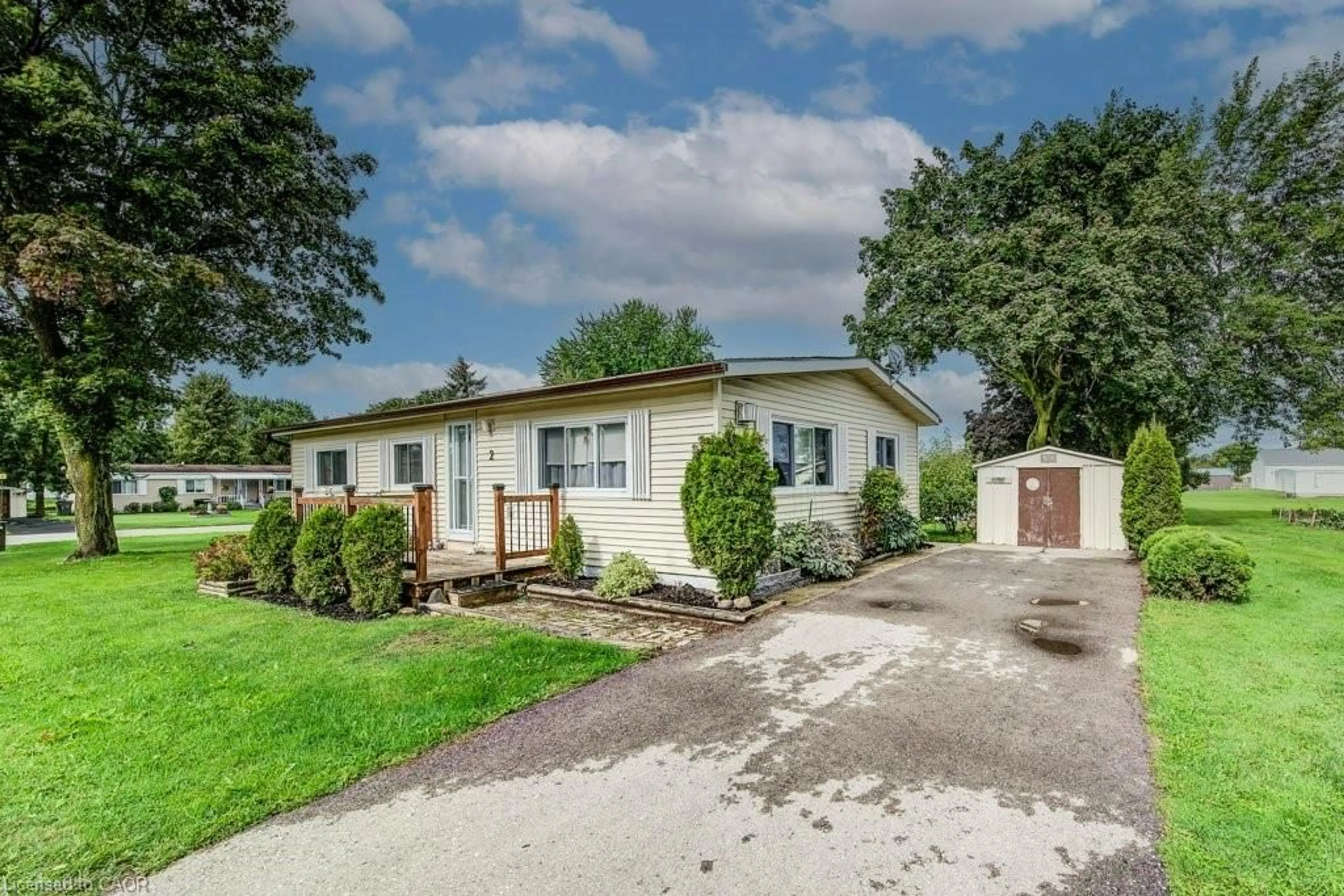 A pic from outside/outdoor area/front of a property/back of a property/a pic from drone, street for 2 Fairview Cres, Listowel Ontario N4W 3G8