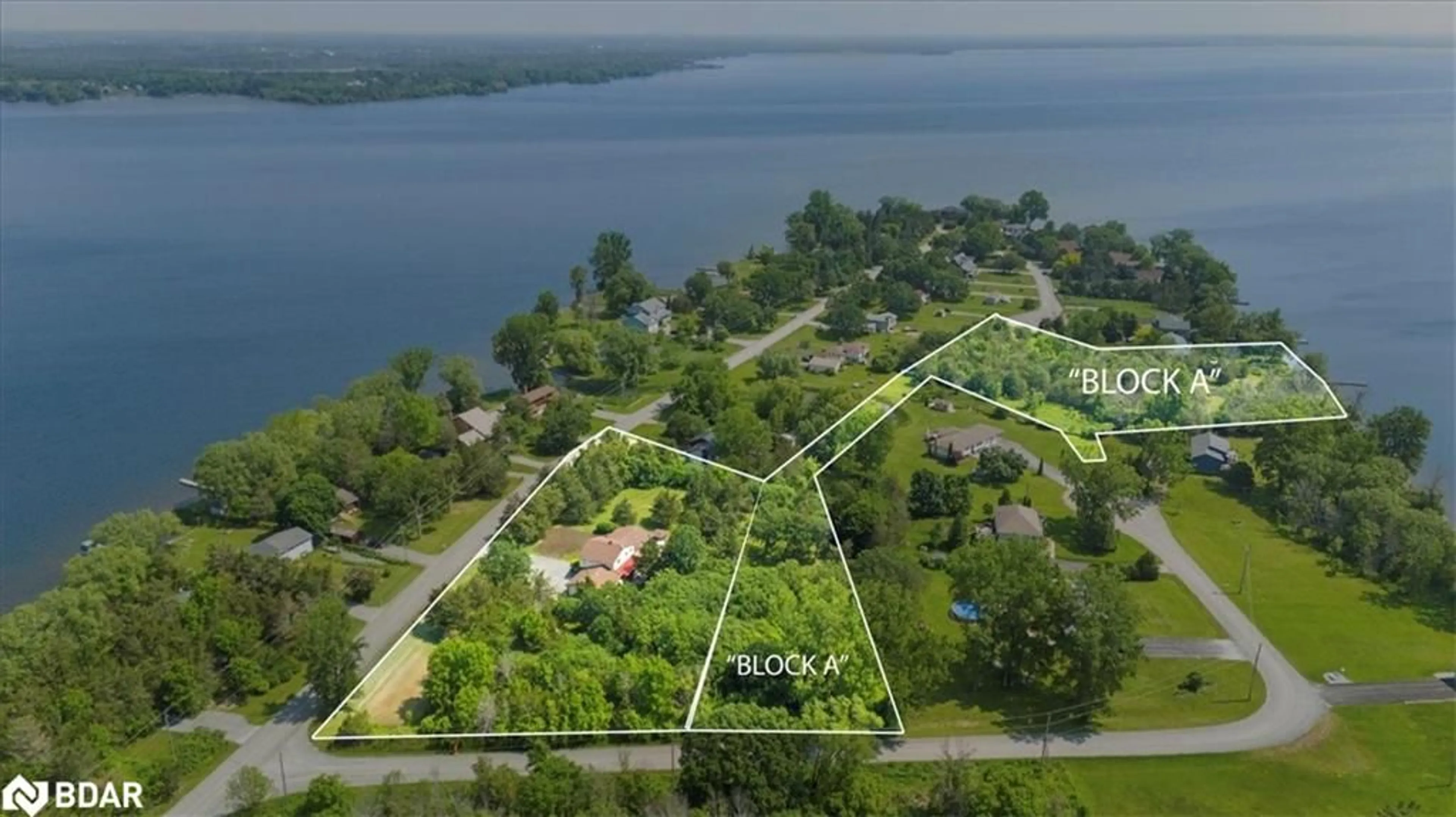 A pic from outside/outdoor area/front of a property/back of a property/a pic from drone, water/lake/river/ocean view for 338 Sunrise Dr Dr, Prince Edward County Ontario K8N 4Z7