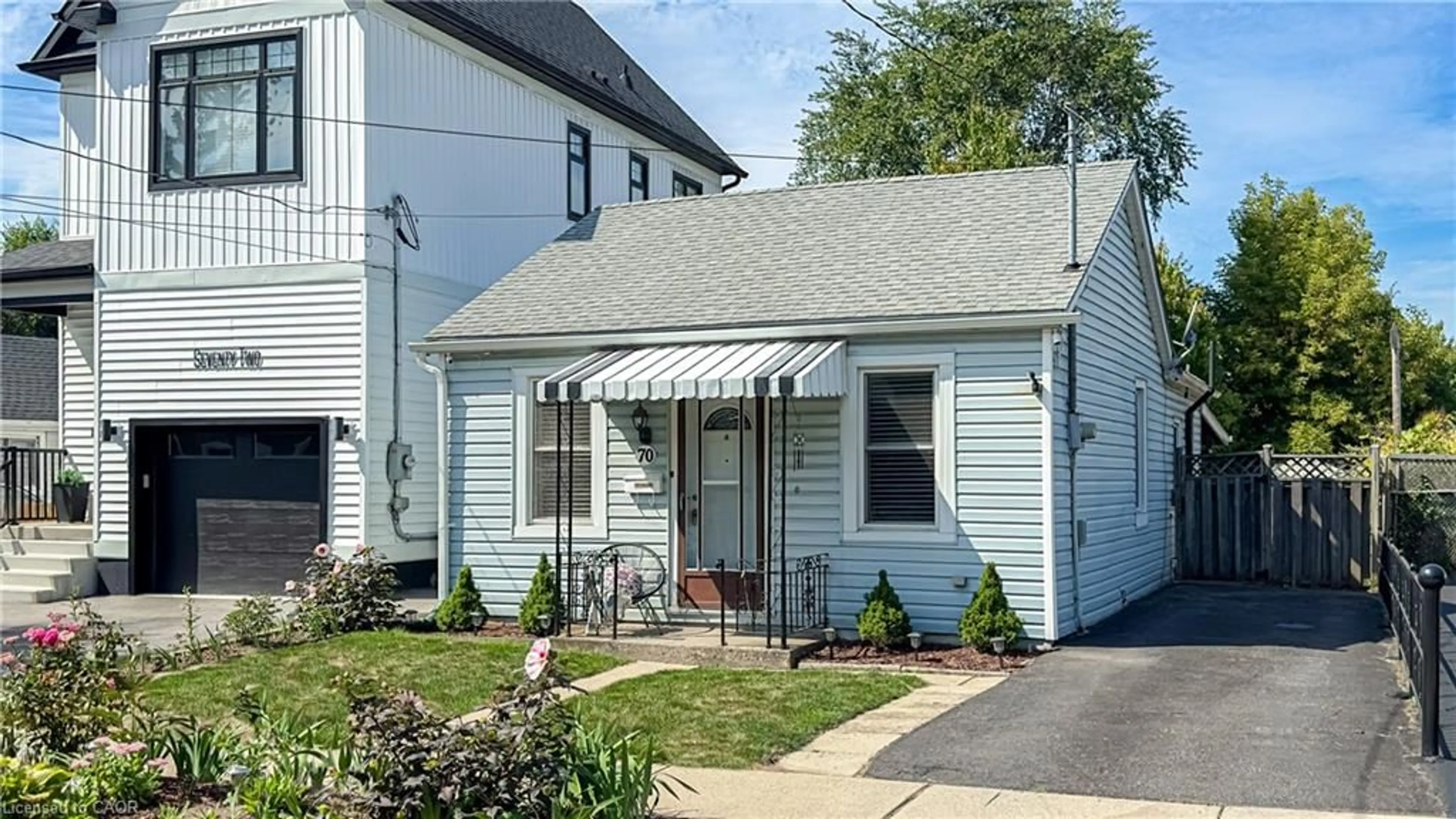 Home with vinyl exterior material, street for 70 Poulette St, Hamilton Ontario L8P 4E2