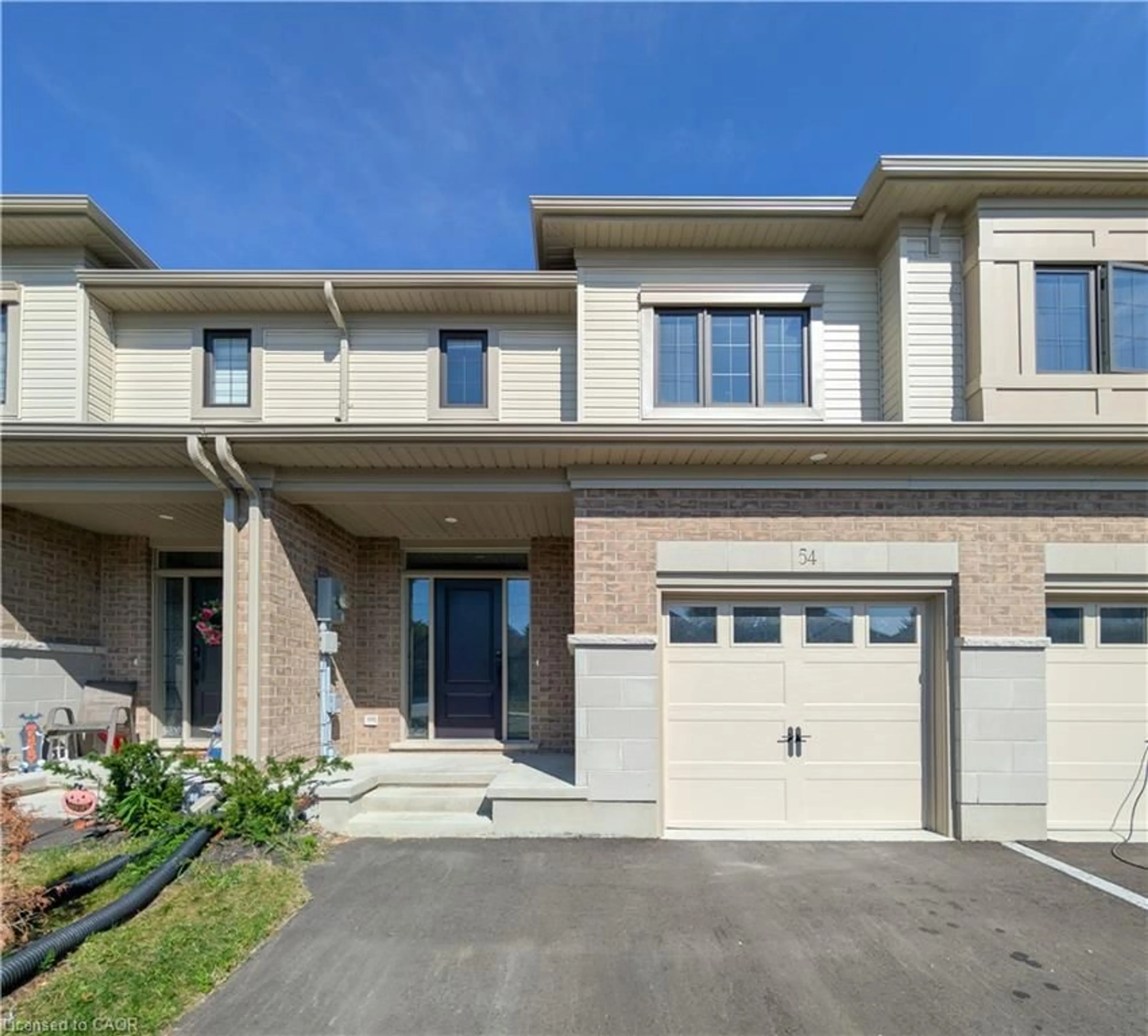Home with brick exterior material, street for 54 Lark St, Tillsonburg Ontario N4G 0K8