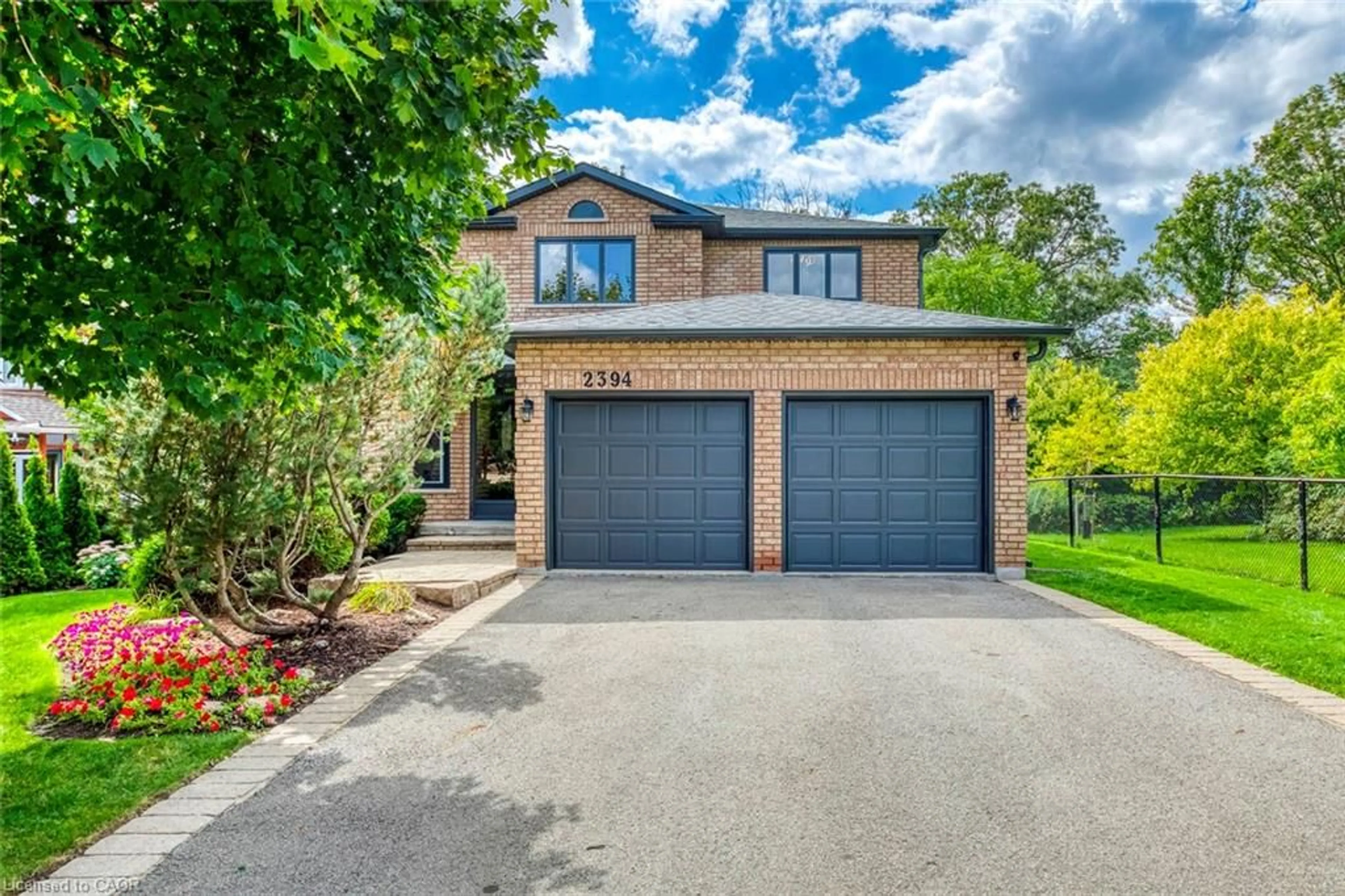 Home with brick exterior material, street for 2394 Wynten Way, Oakville Ontario L6J 7K9