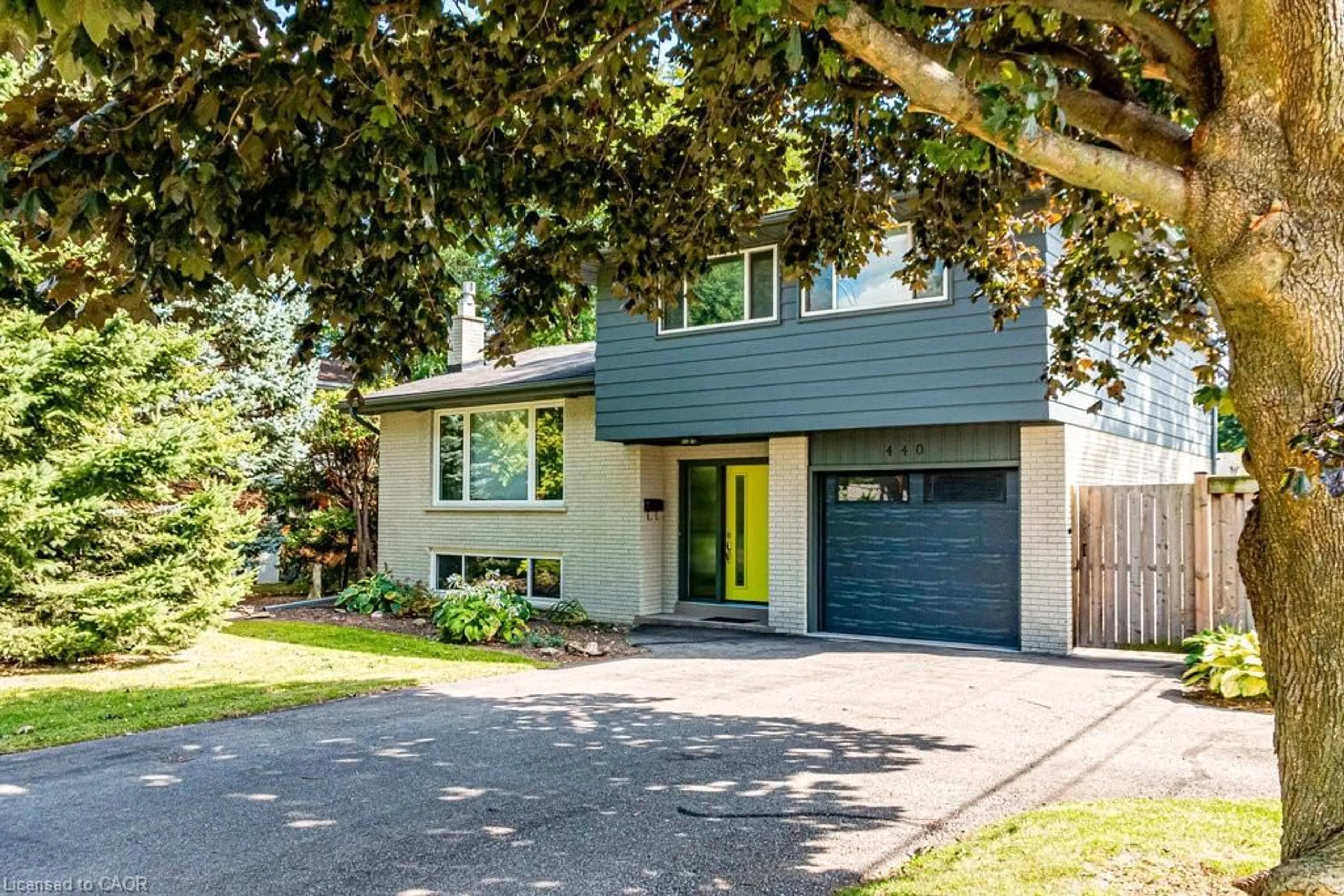 Home with vinyl exterior material, street for 440 John Frederick Dr, Hamilton Ontario L9G 2R2