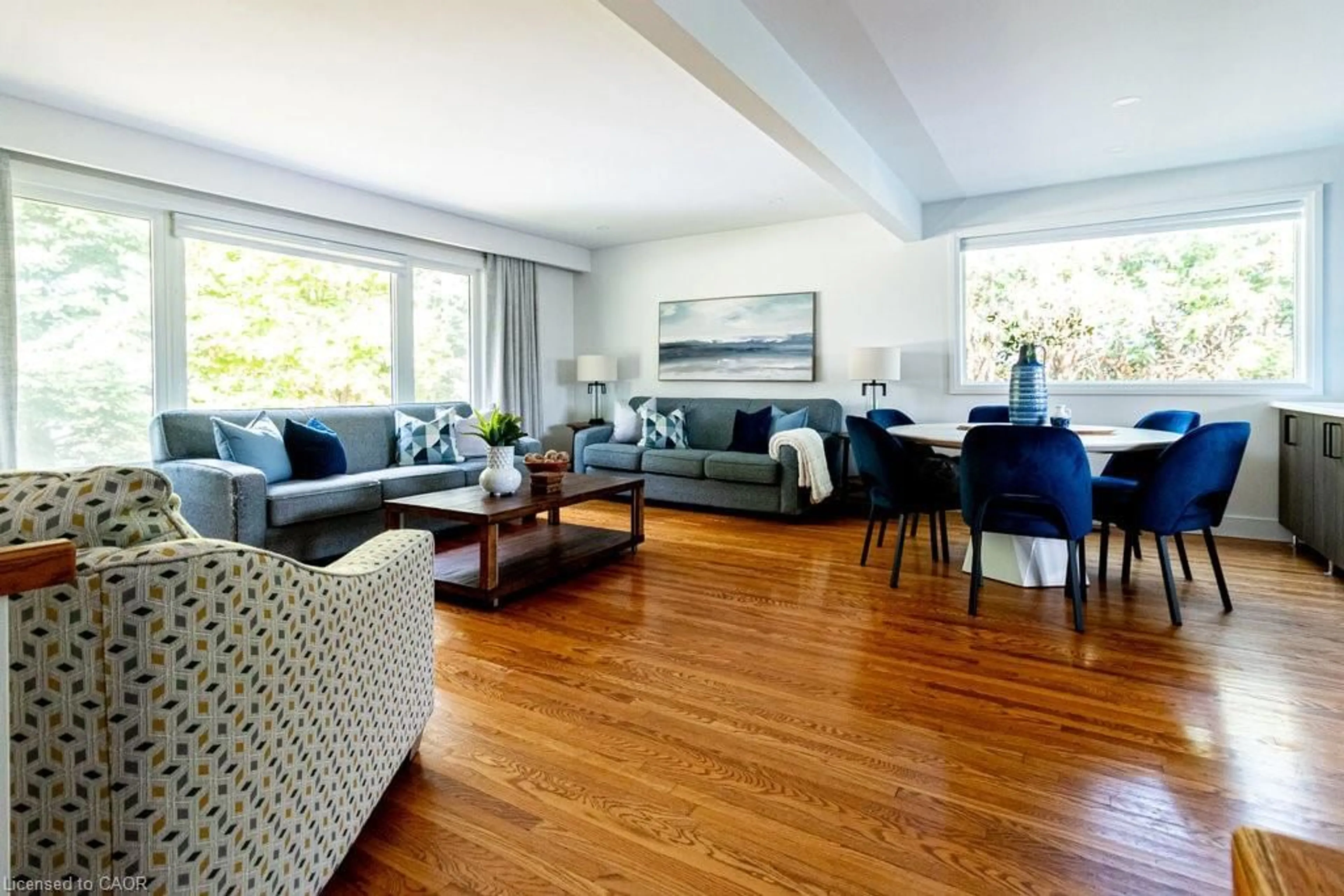 Living room with furniture, wood/laminate floor for 440 John Frederick Dr, Hamilton Ontario L9G 2R2