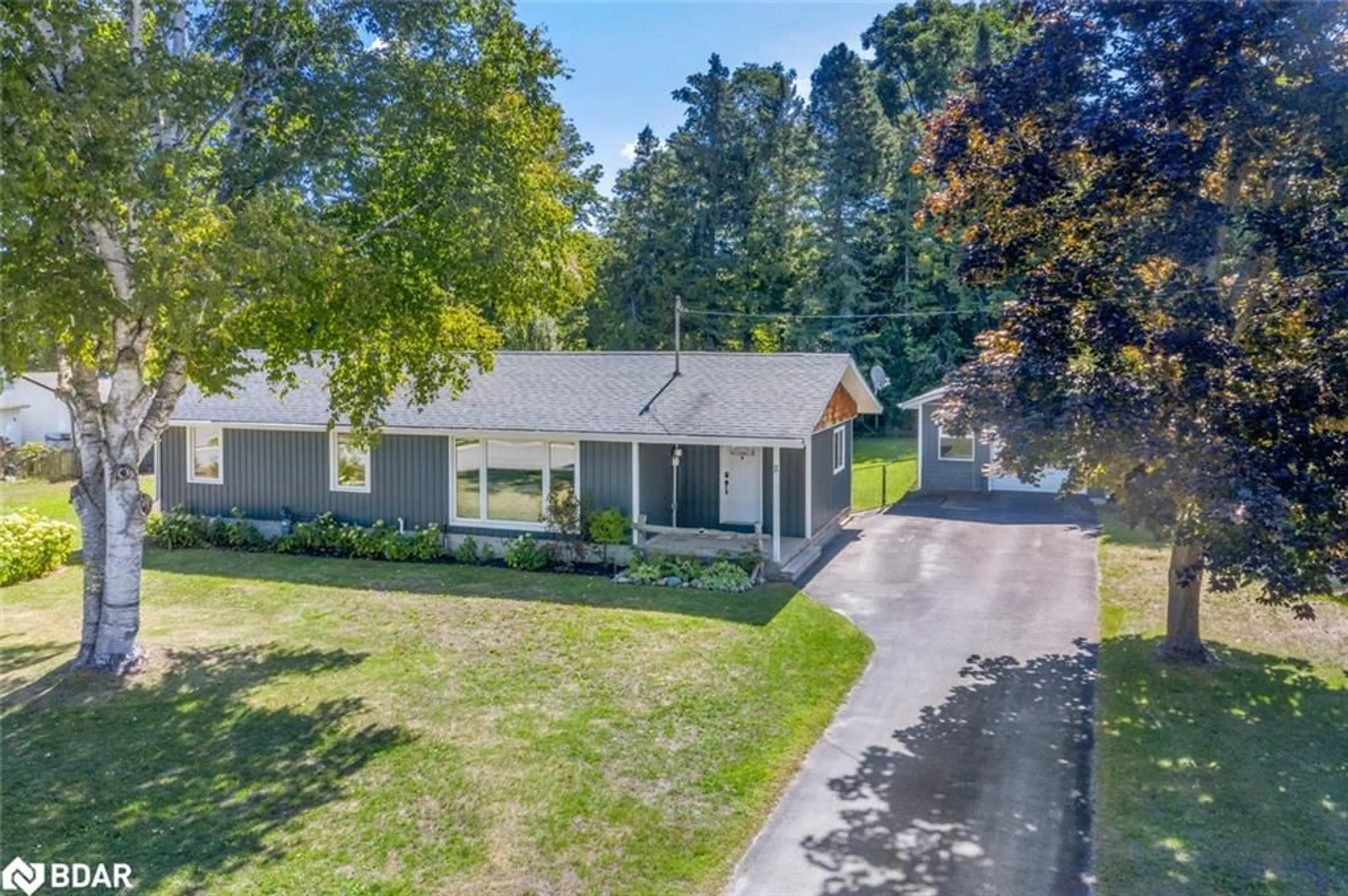A pic from outside/outdoor area/front of a property/back of a property/a pic from drone, street for 11 Albert St, Springwater Ontario L0L 1V0