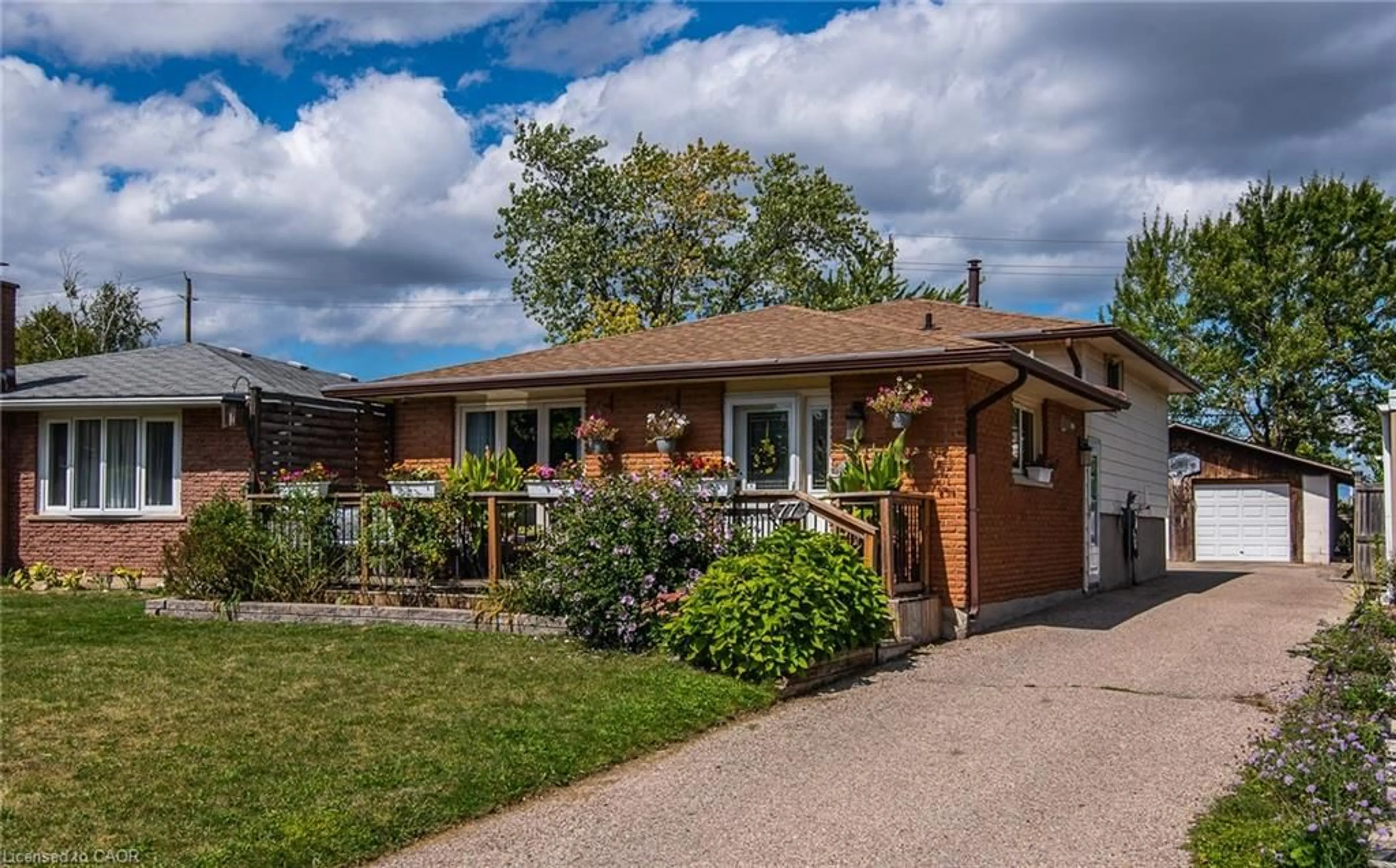 Home with brick exterior material, street for 77 Roberts Cres, Kitchener Ontario N2E 1A6