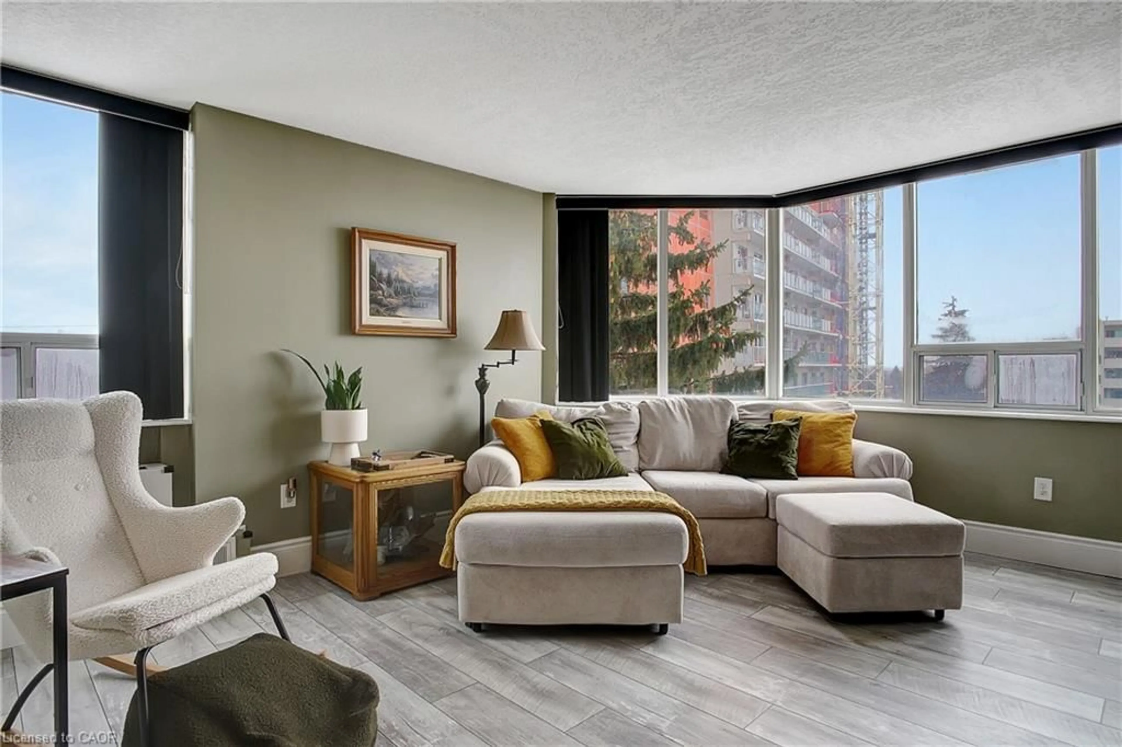 Living room with furniture, unknown for 3227 King St #409, Kitchener Ontario N2A 3Z9
