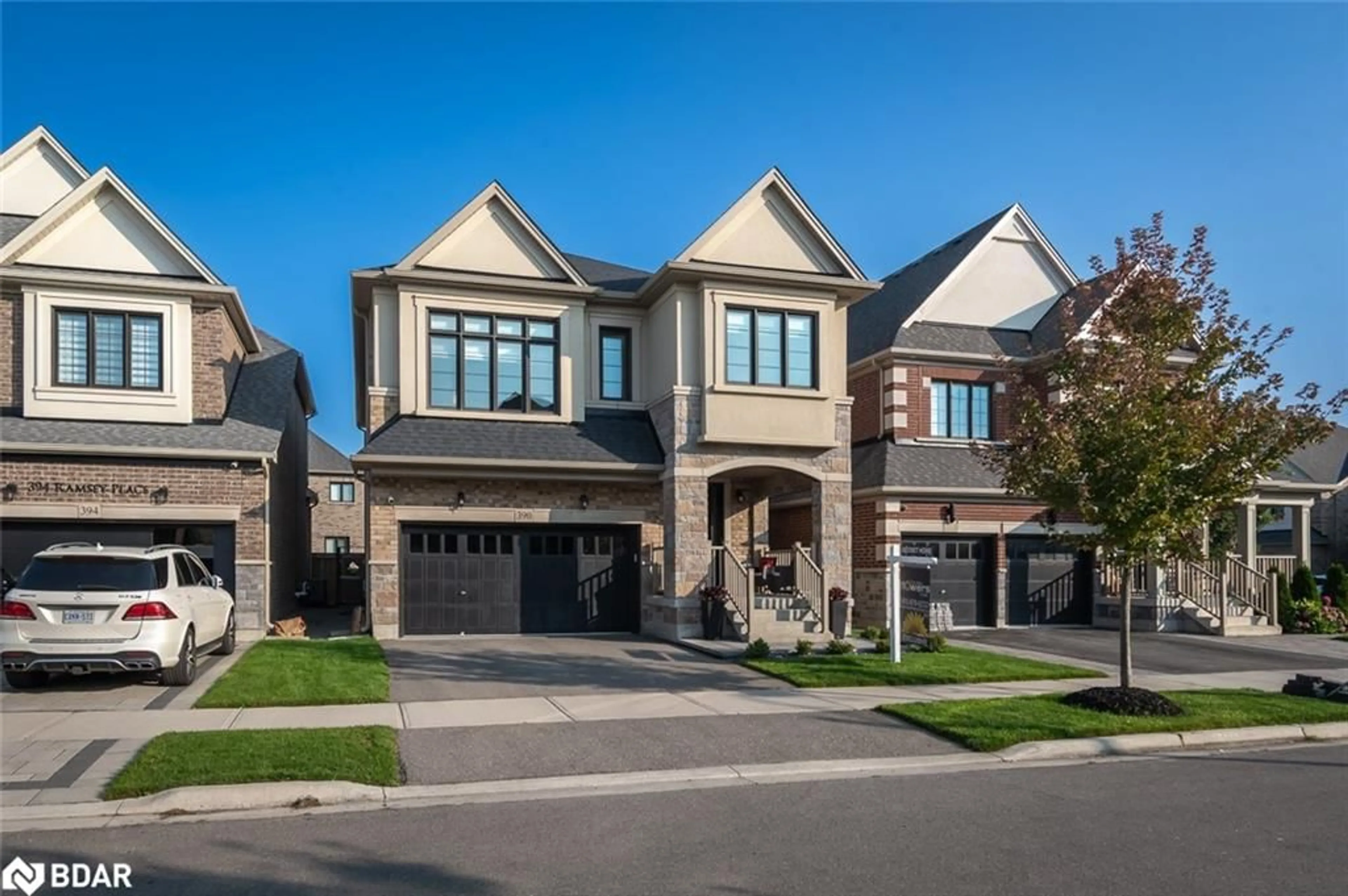 Home with brick exterior material, street for 390 Ramsey Pl, Milton Ontario L9E 1N3