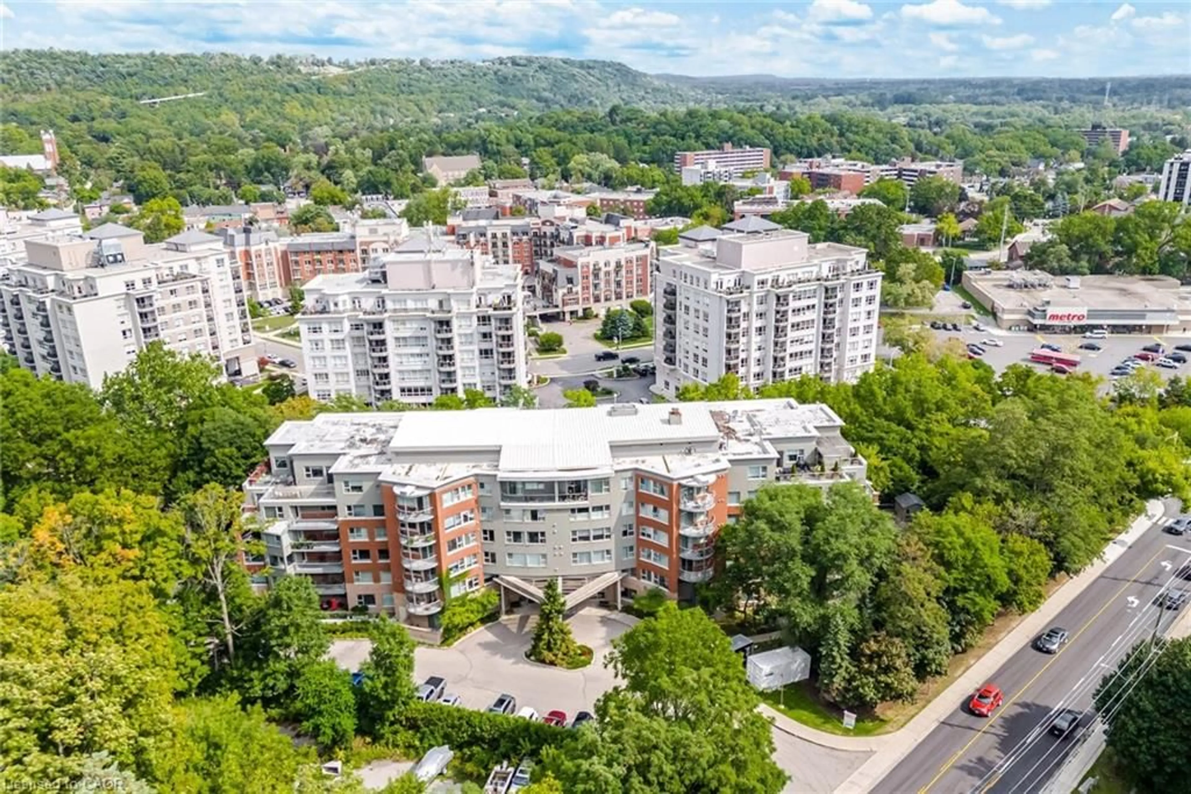 A pic from outside/outdoor area/front of a property/back of a property/a pic from drone, city buildings view from balcony for 77 Governors Rd #204, Dundas Ontario L9H 7N8