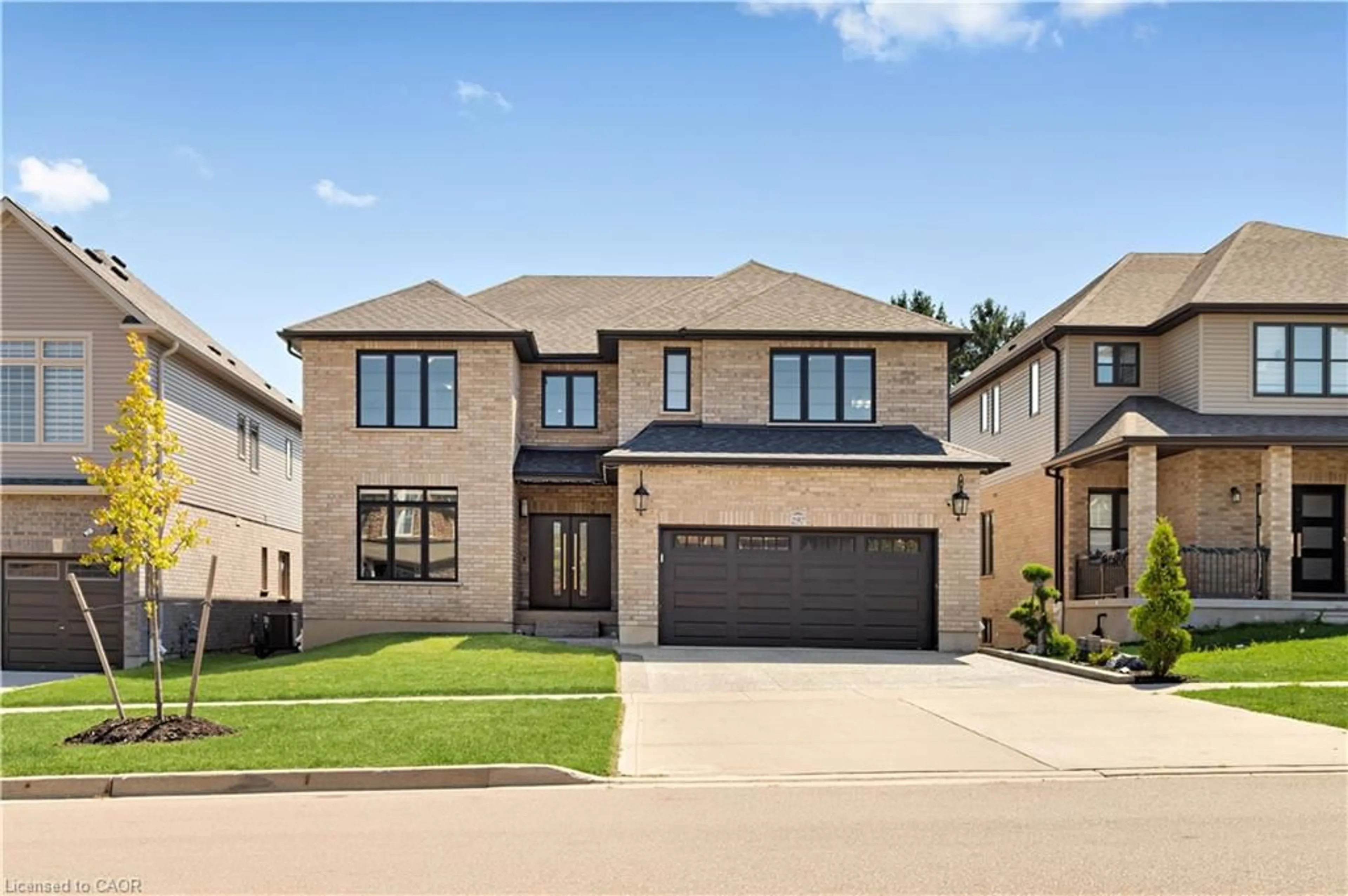 Home with brick exterior material, street for 297 Blair Creek Dr, Kitchener Ontario N2P 0G4