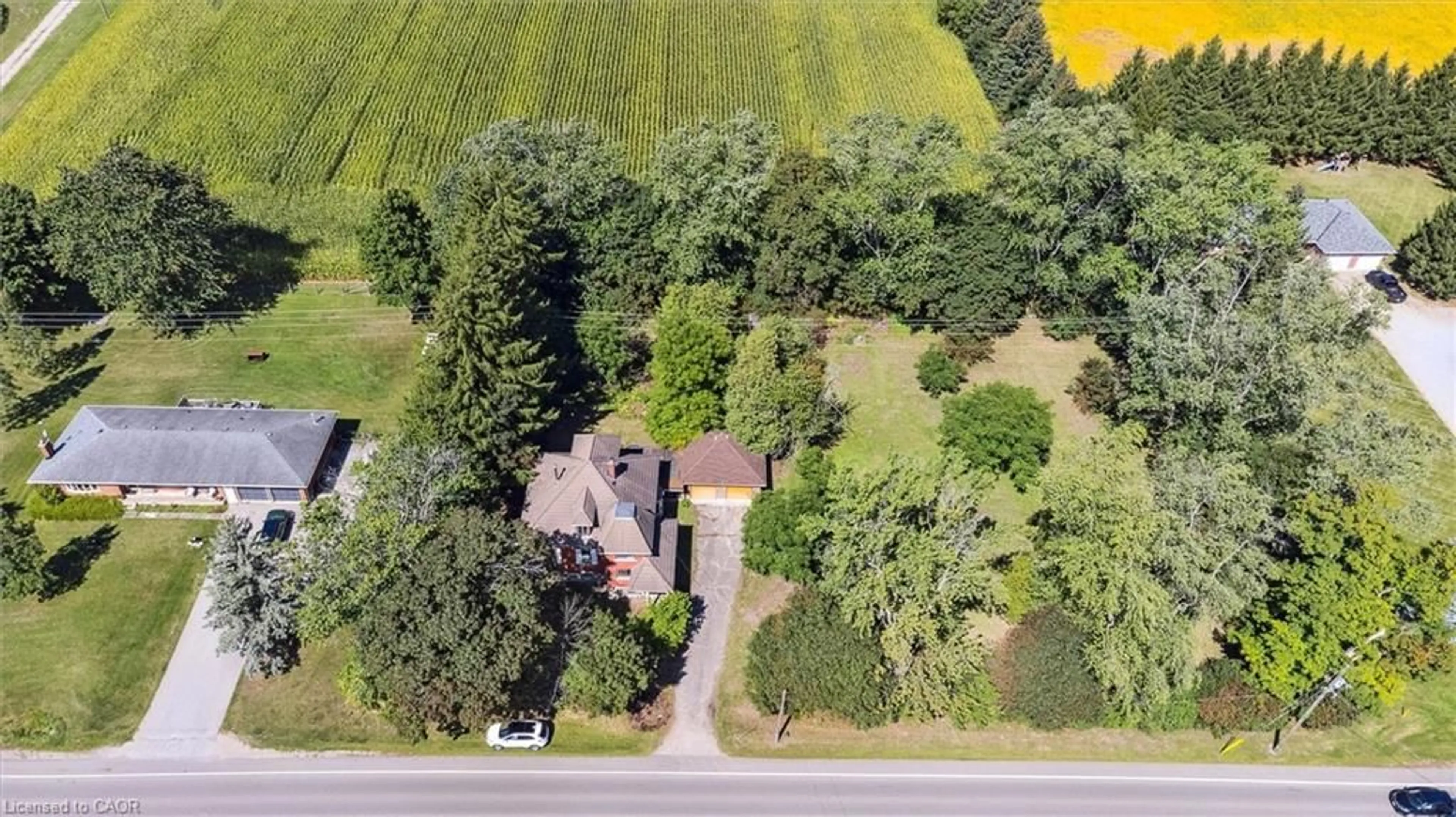 A pic from outside/outdoor area/front of a property/back of a property/a pic from drone, street for 7216 Wellington Rd, Guelph Ontario N0B 1B0