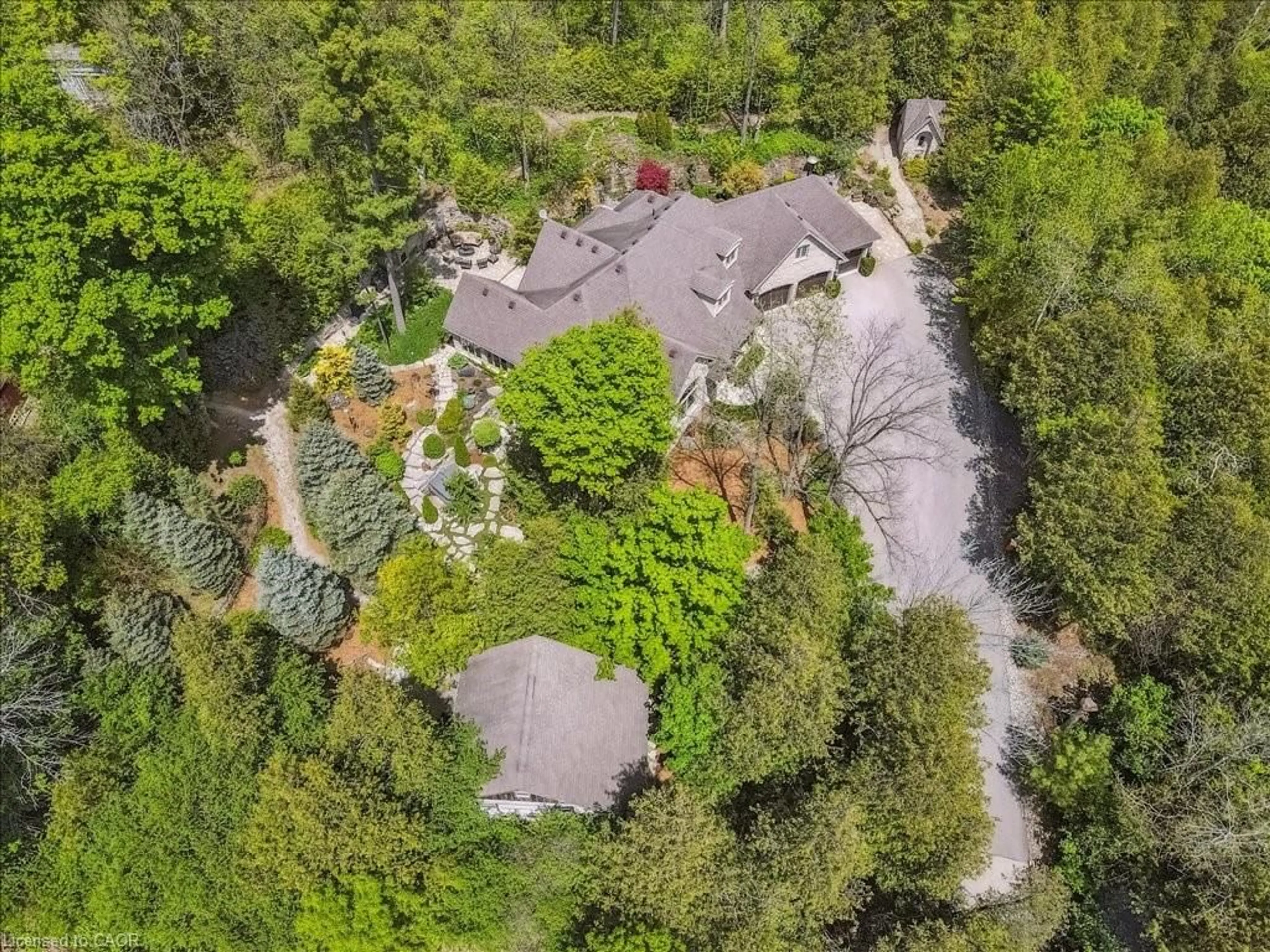 A pic from outside/outdoor area/front of a property/back of a property/a pic from drone, forest/trees view for 198 Pasmore St, Rockwood Ontario N0B 2K0