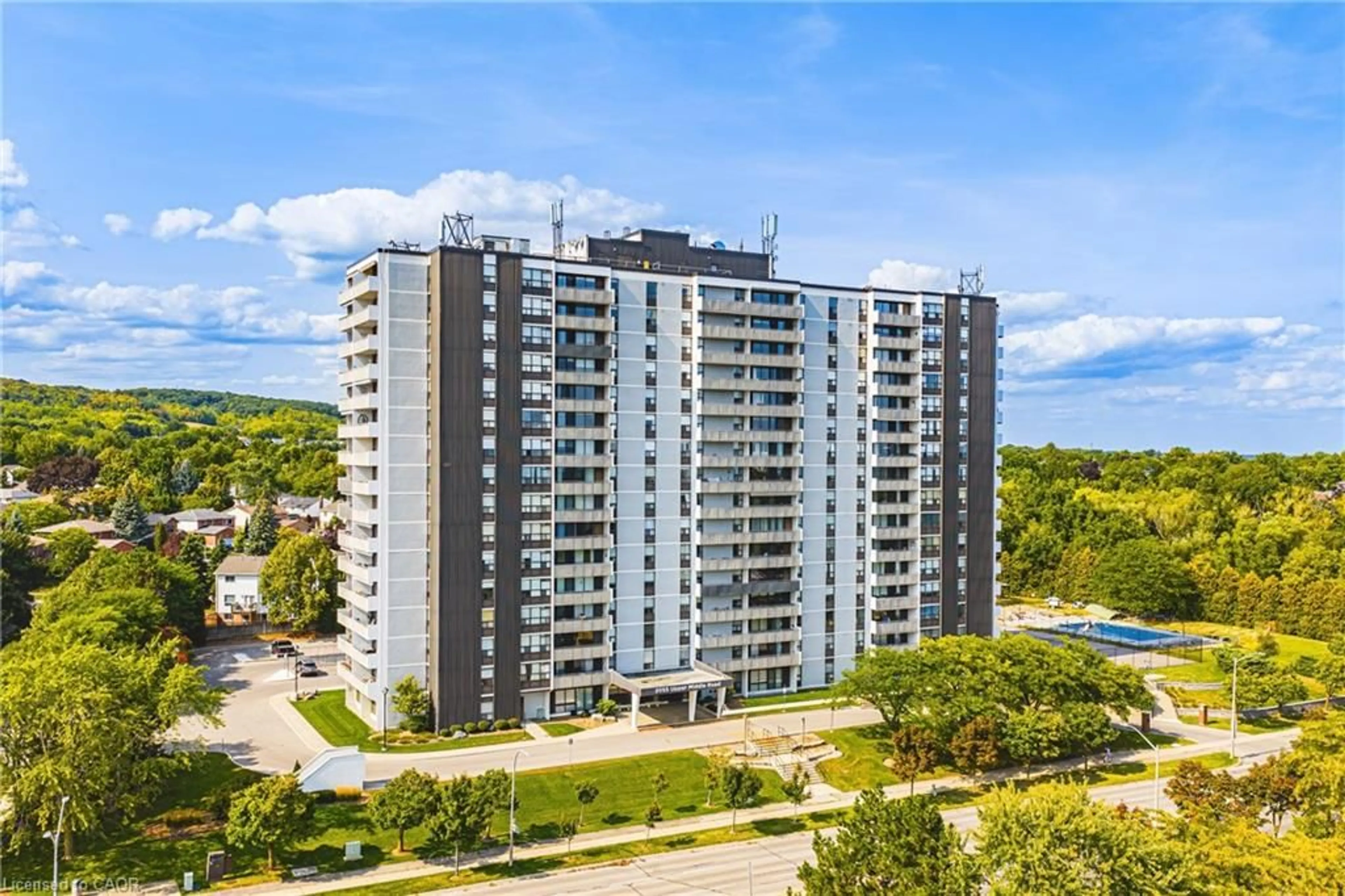 A pic from outside/outdoor area/front of a property/back of a property/a pic from drone, building for 2055 Upper Middle Rd #509, Burlington Ontario L7P 3P4