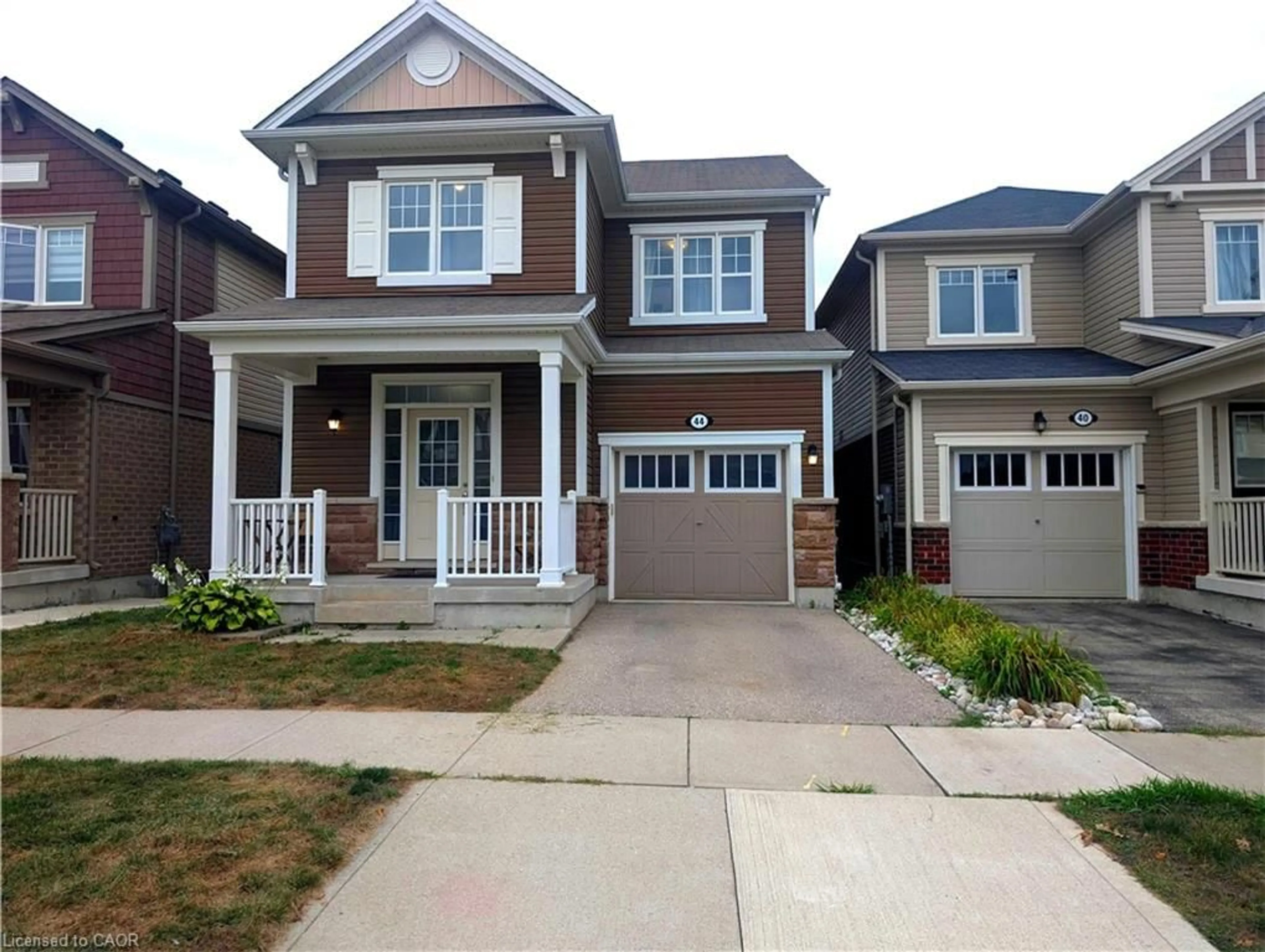 Home with brick exterior material, street for 44 Postmaster Dr, Kitchener Ontario N2R 0J2