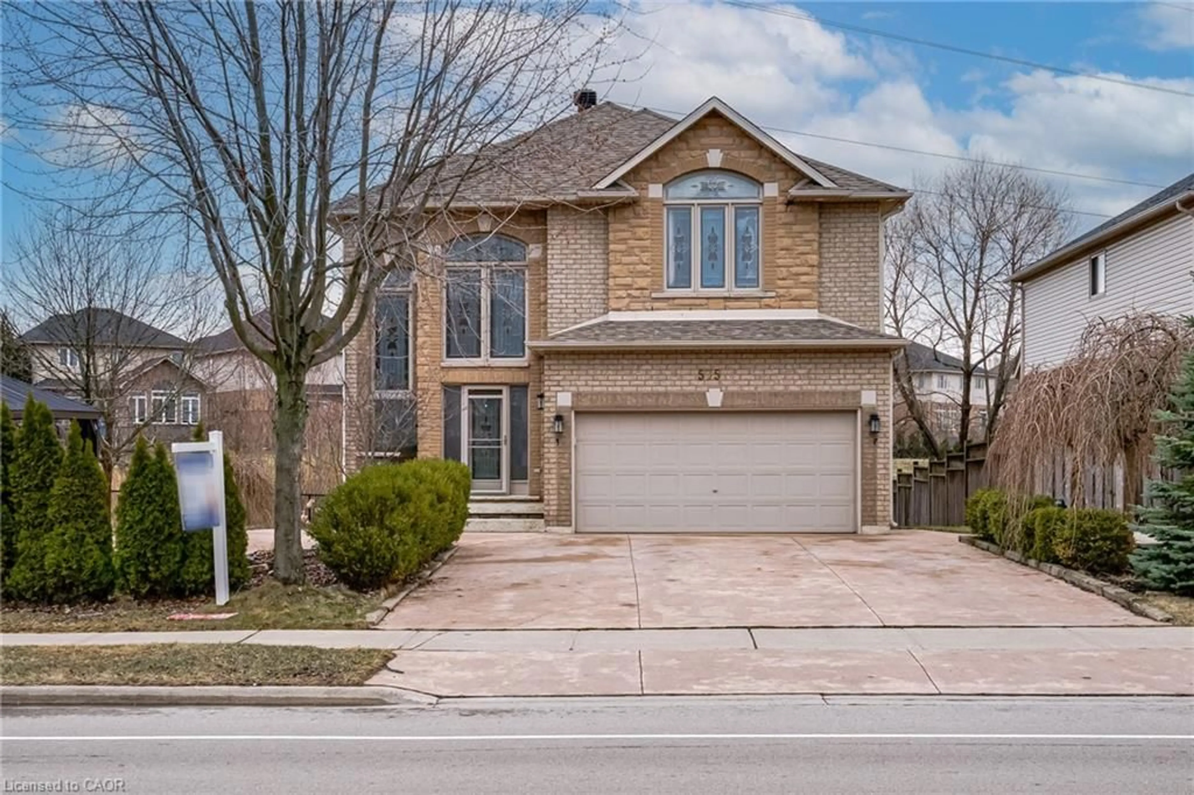 Home with brick exterior material, street for 575 Stonehenge Dr, Ancaster Ontario L9K 1T4