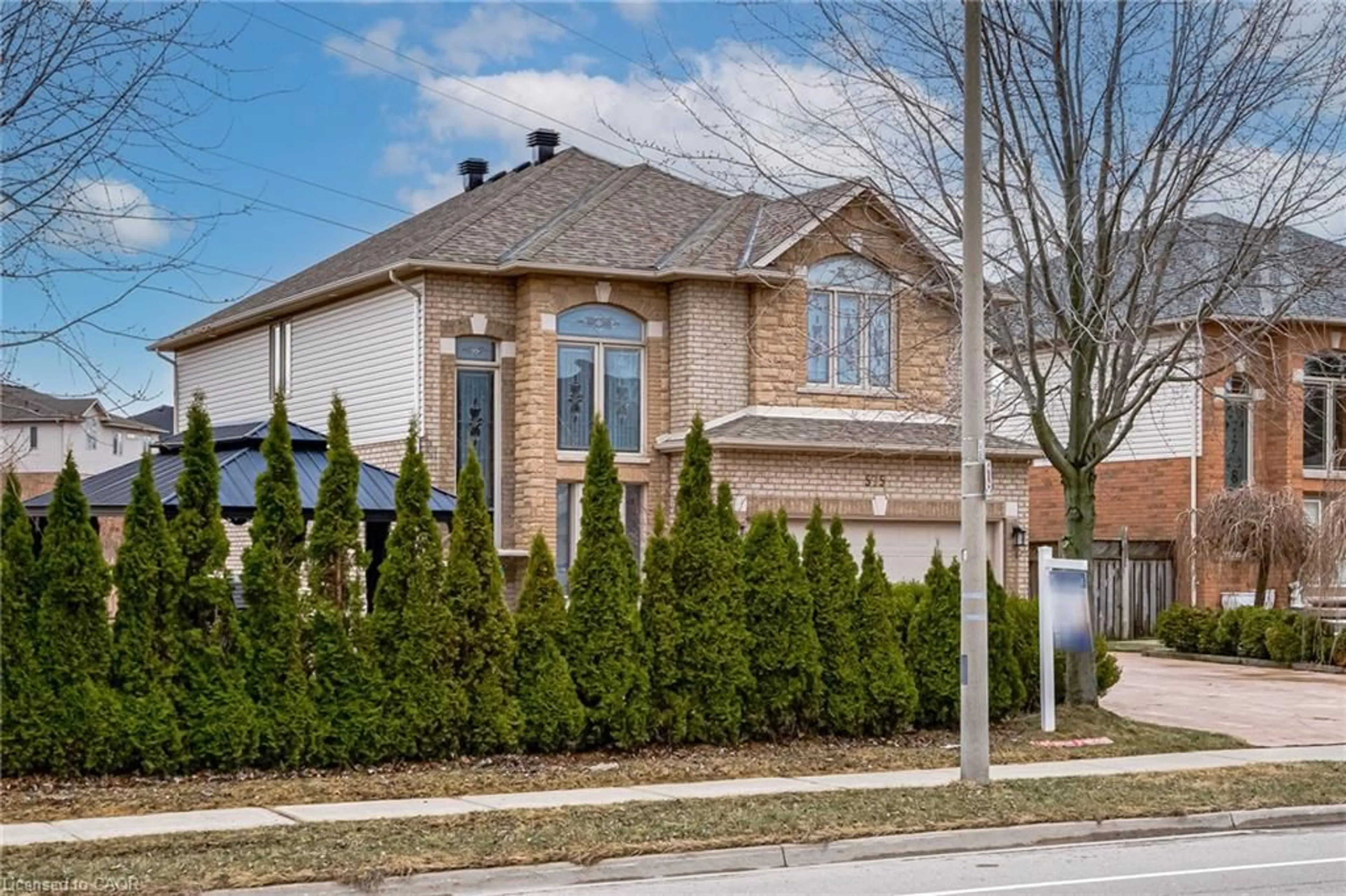 Home with brick exterior material, street for 575 Stonehenge Dr, Ancaster Ontario L9K 1T4