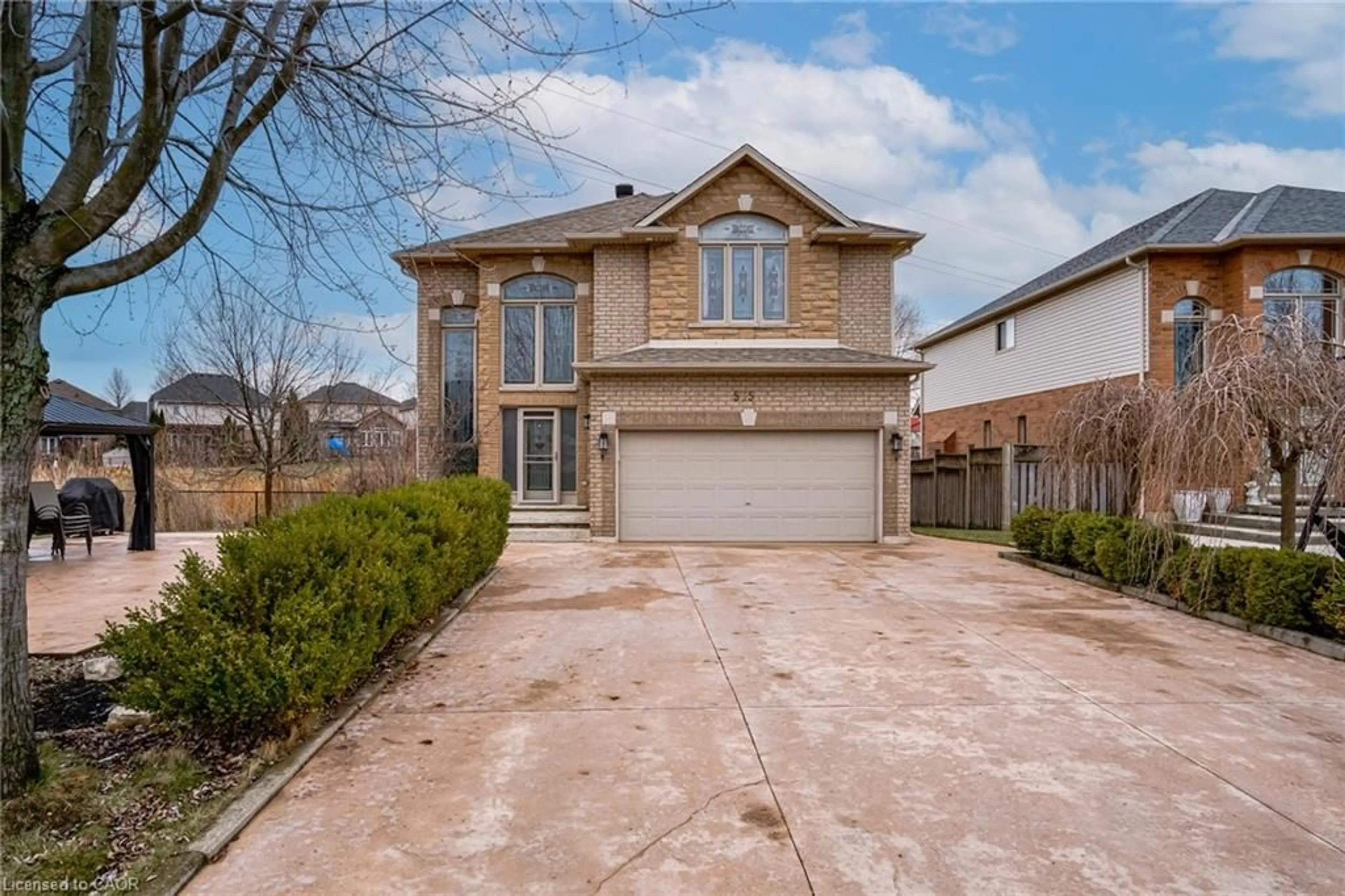 Home with brick exterior material, street for 575 Stonehenge Dr, Ancaster Ontario L9K 1T4