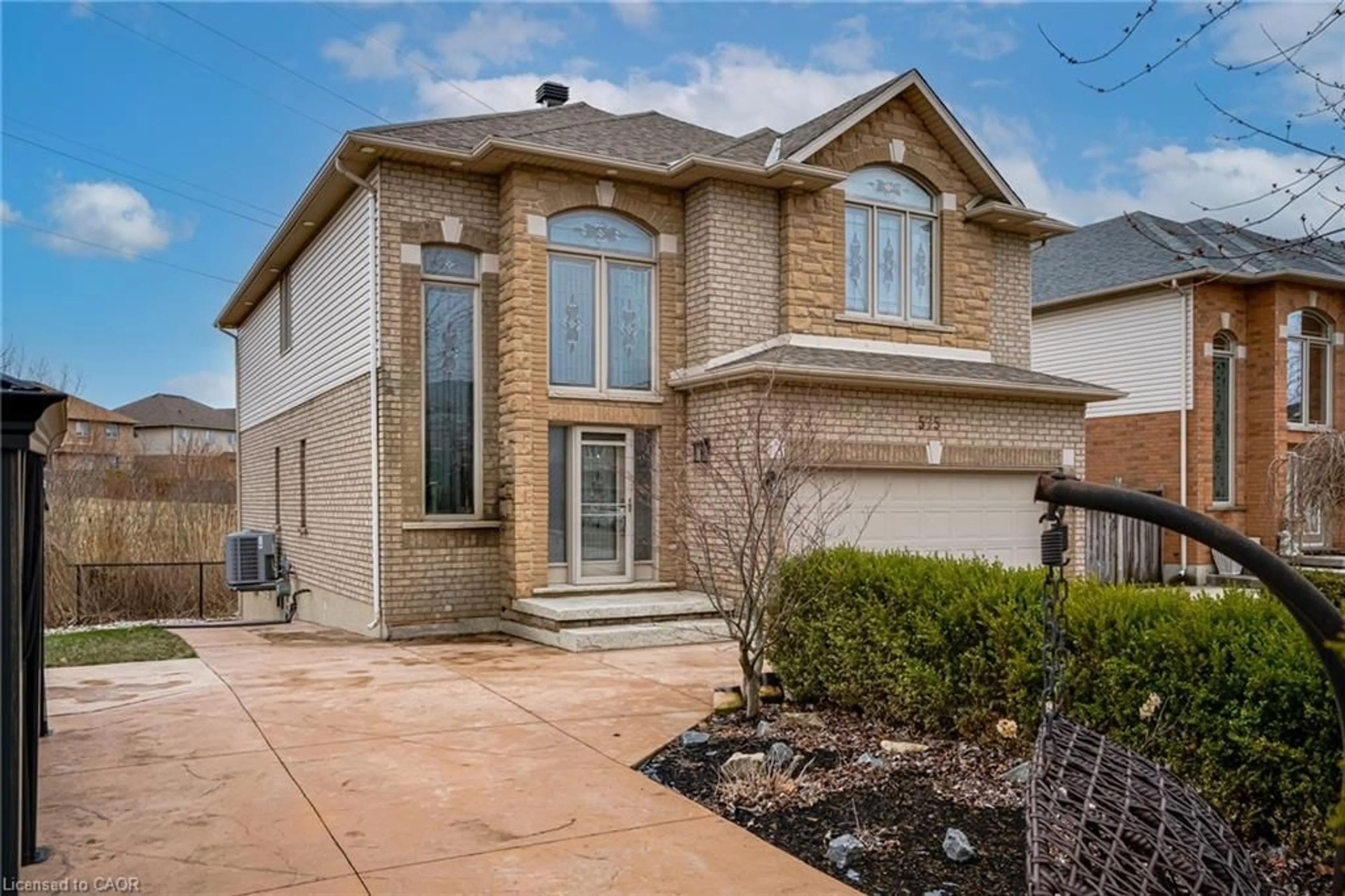 Home with brick exterior material, street for 575 Stonehenge Dr, Ancaster Ontario L9K 1T4