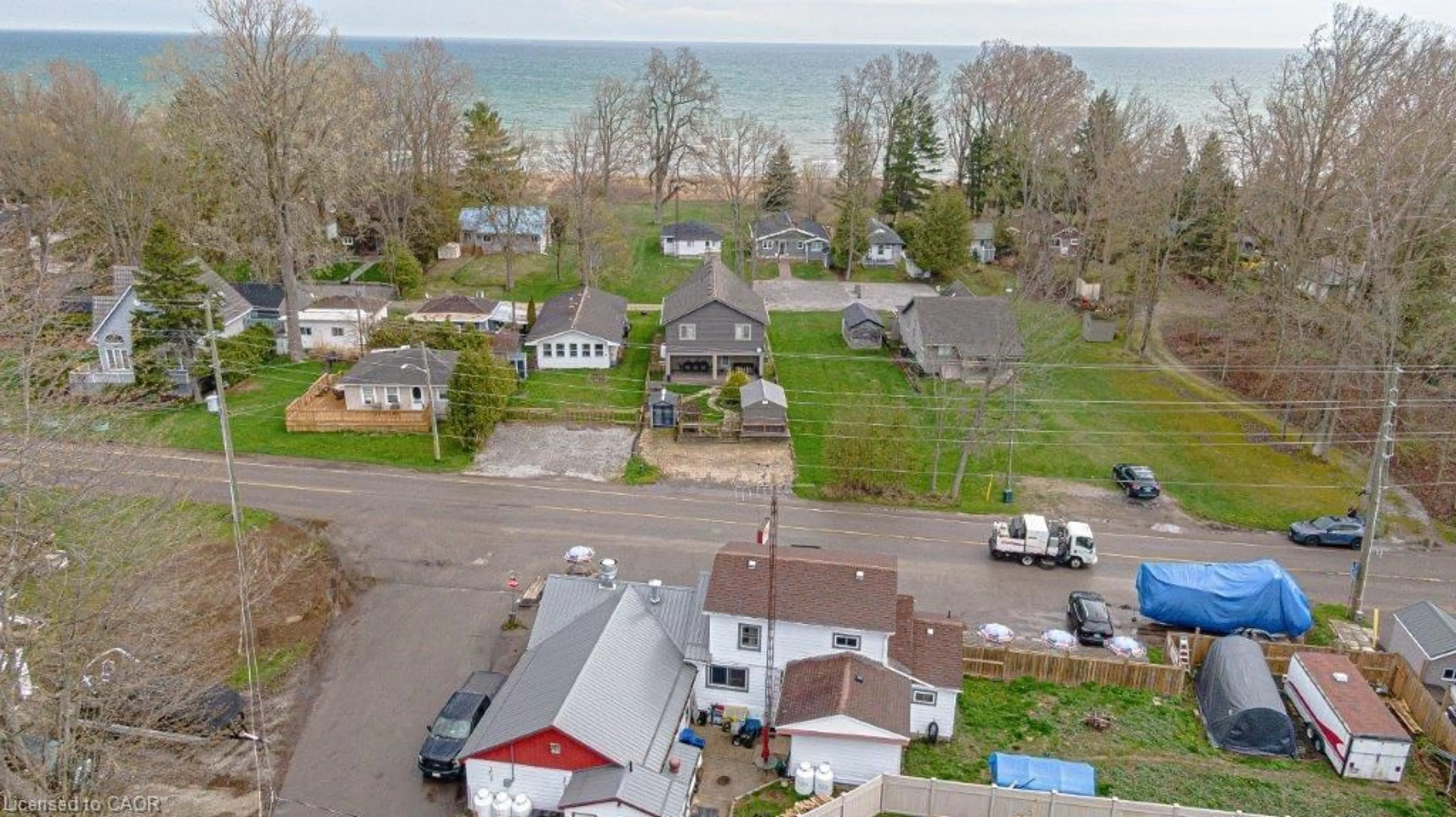 A pic from outside/outdoor area/front of a property/back of a property/a pic from drone, water/lake/river/ocean view for 259 Cedar Dr, Turkey Point Ontario N0E 1T0