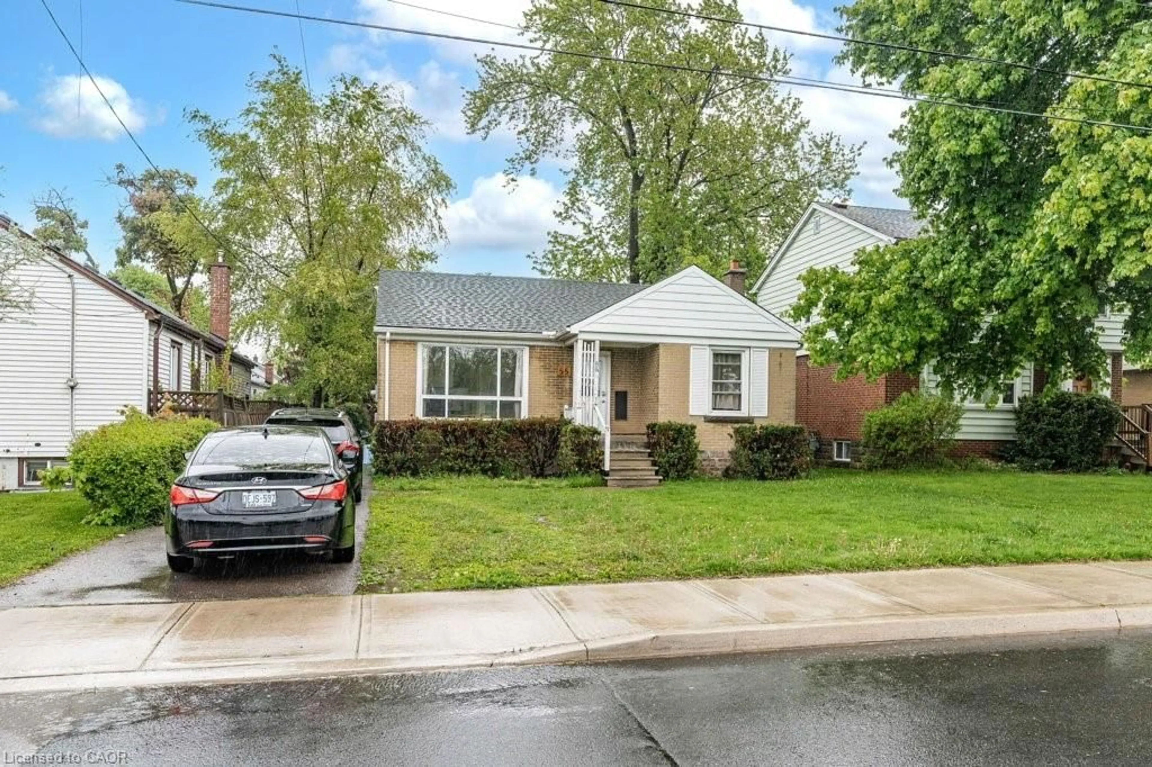 Home with brick exterior material, street for 55 West 5th St, Hamilton Ontario L9C 3N7