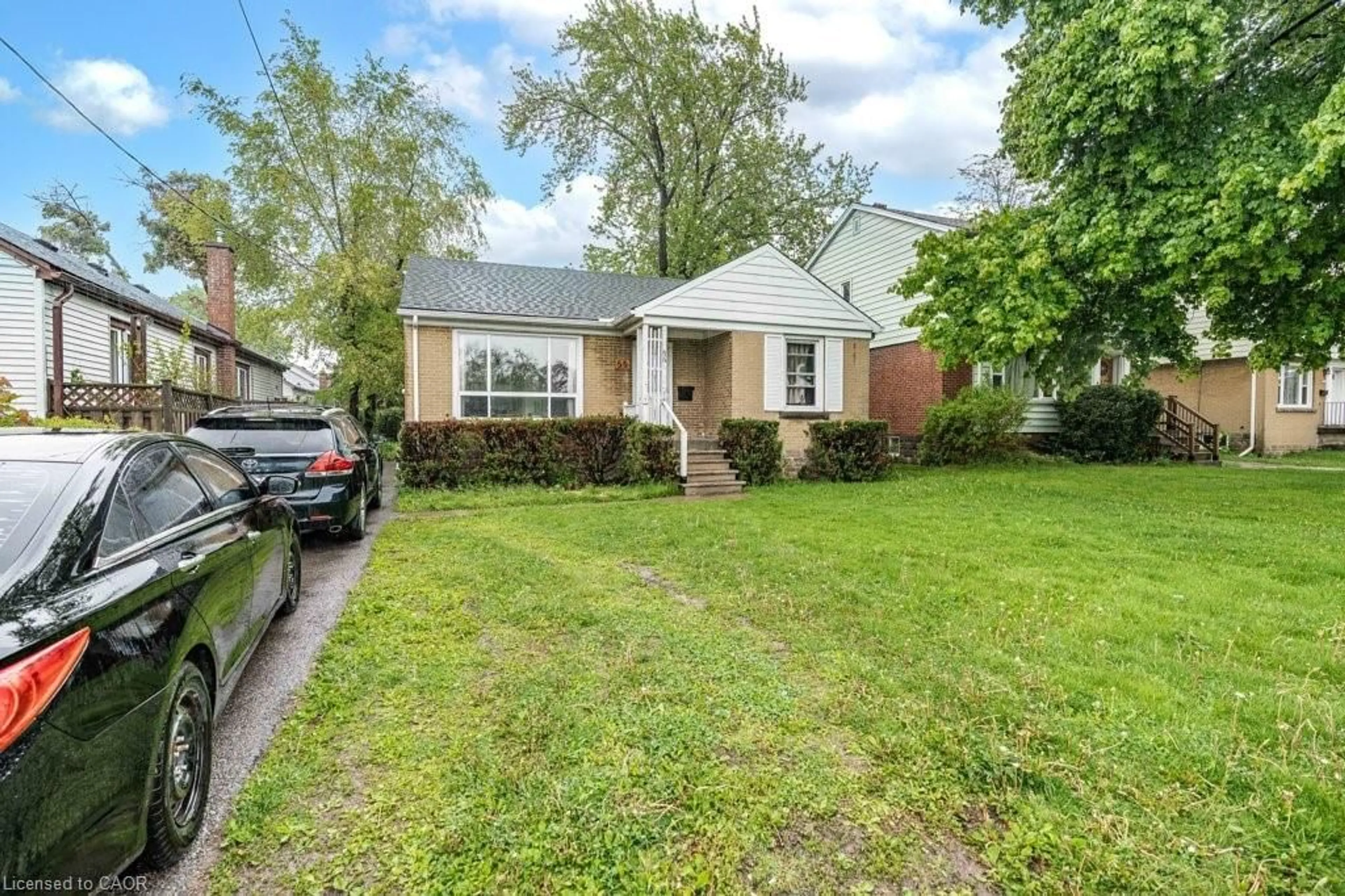 Home with brick exterior material, street for 55 West 5th St, Hamilton Ontario L9C 3N7