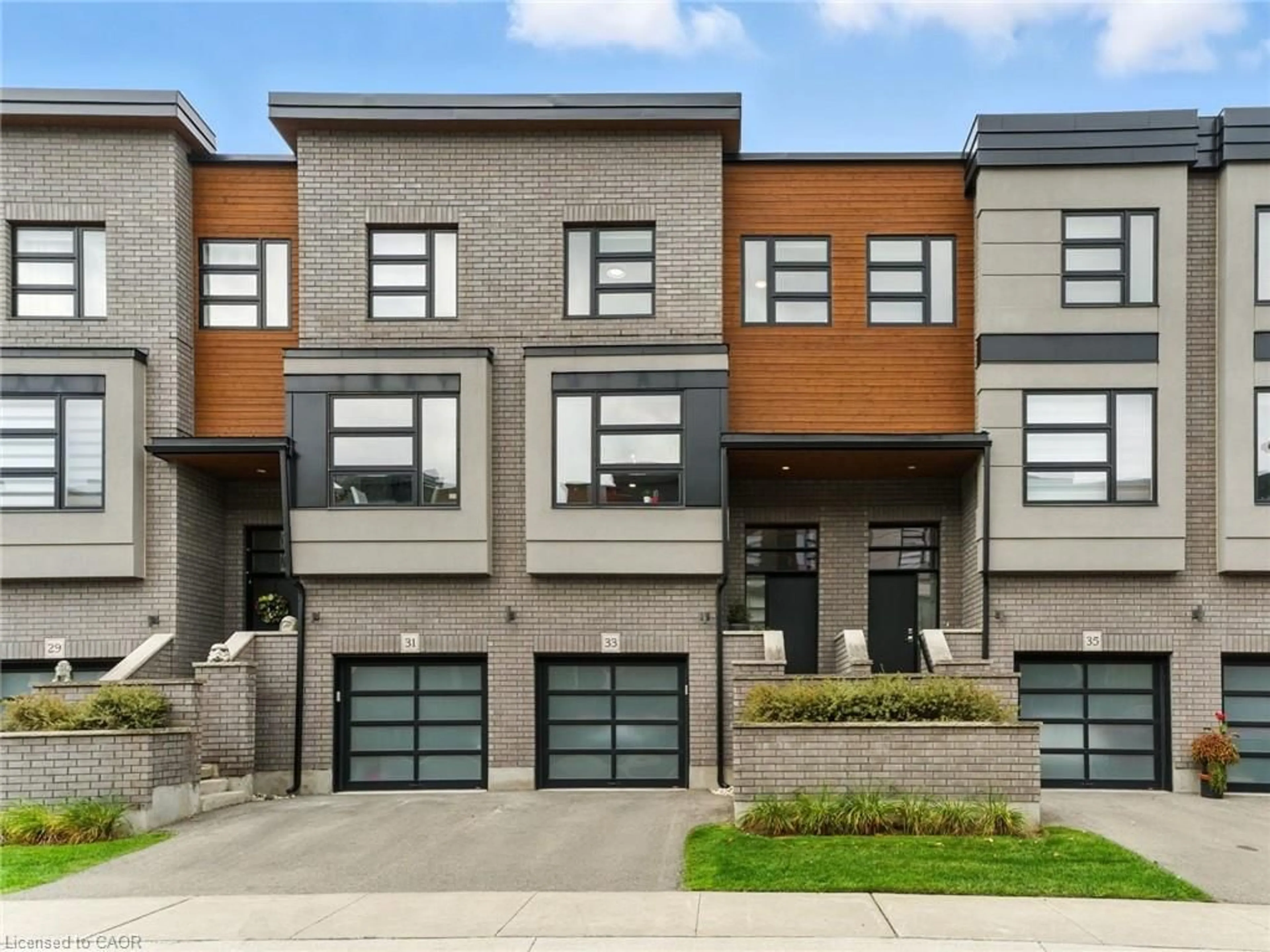 Home with brick exterior material, street for 60 Arkell Rd #33, Guelph Ontario N1L 1G8