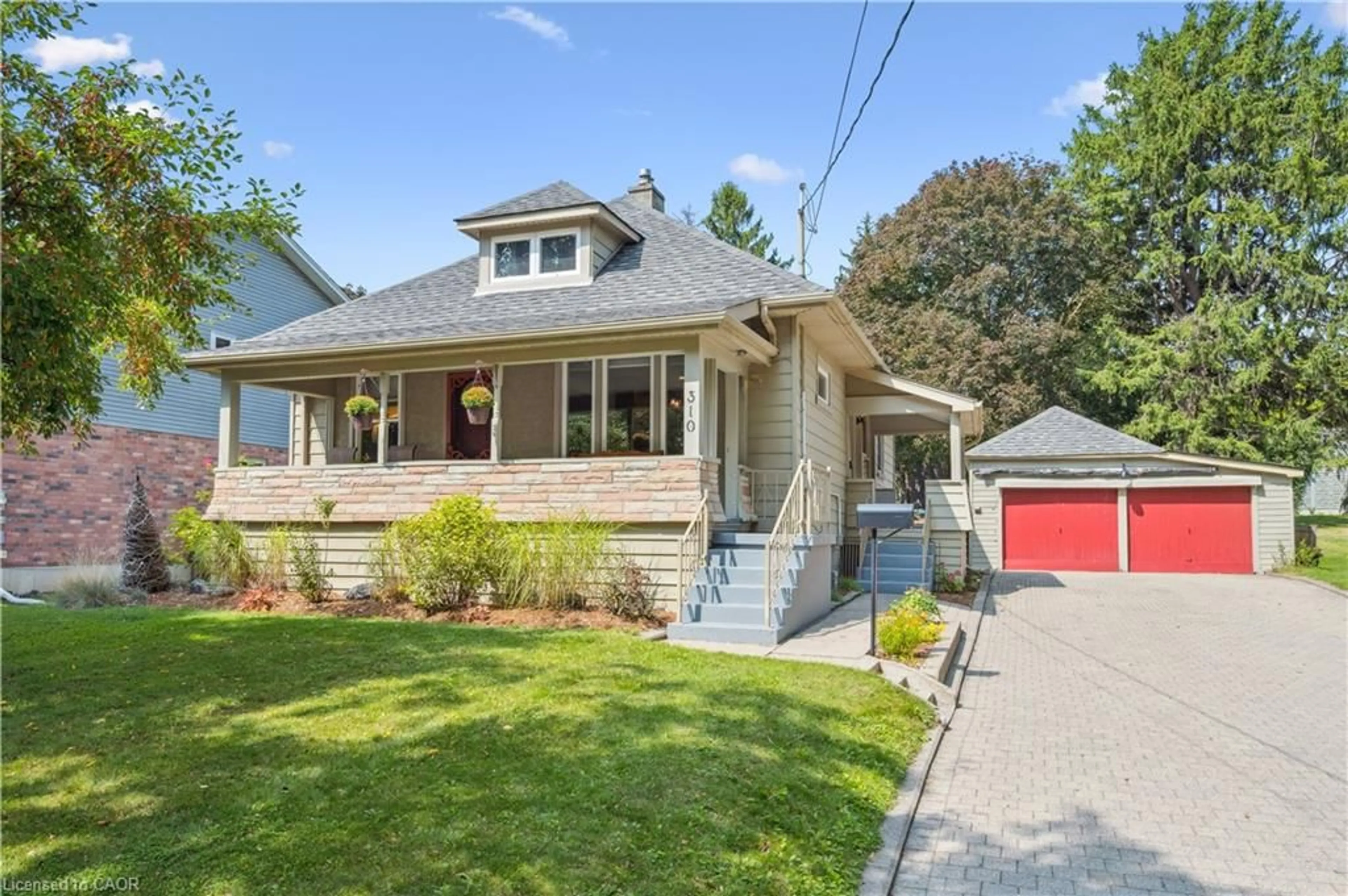 Home with vinyl exterior material, street for 310 Kitchener Rd, Cambridge Ontario N3H 1A6