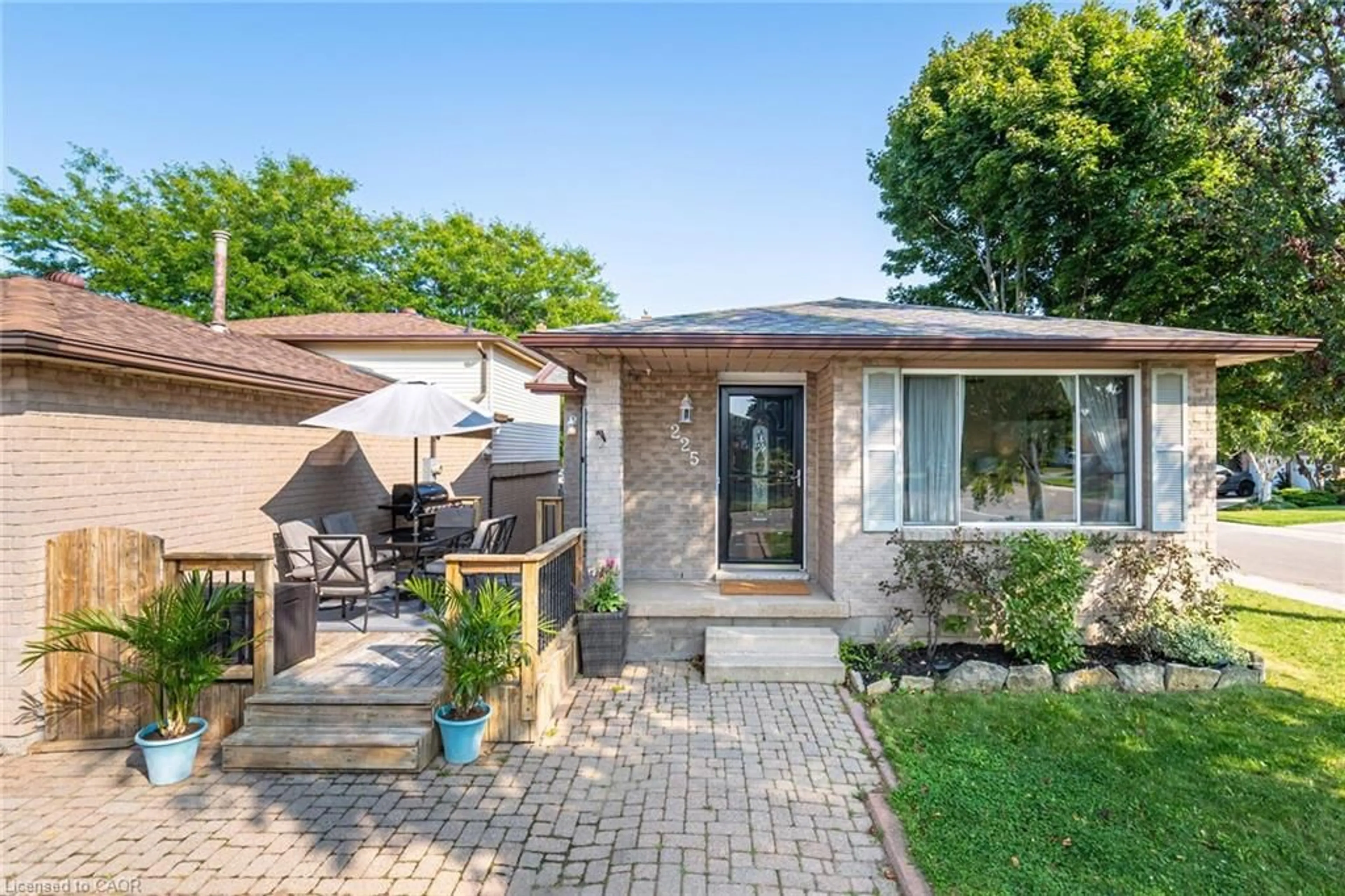 Home with brick exterior material, street for 225 Golfwood Dr, Hamilton Ontario L9C 7C6