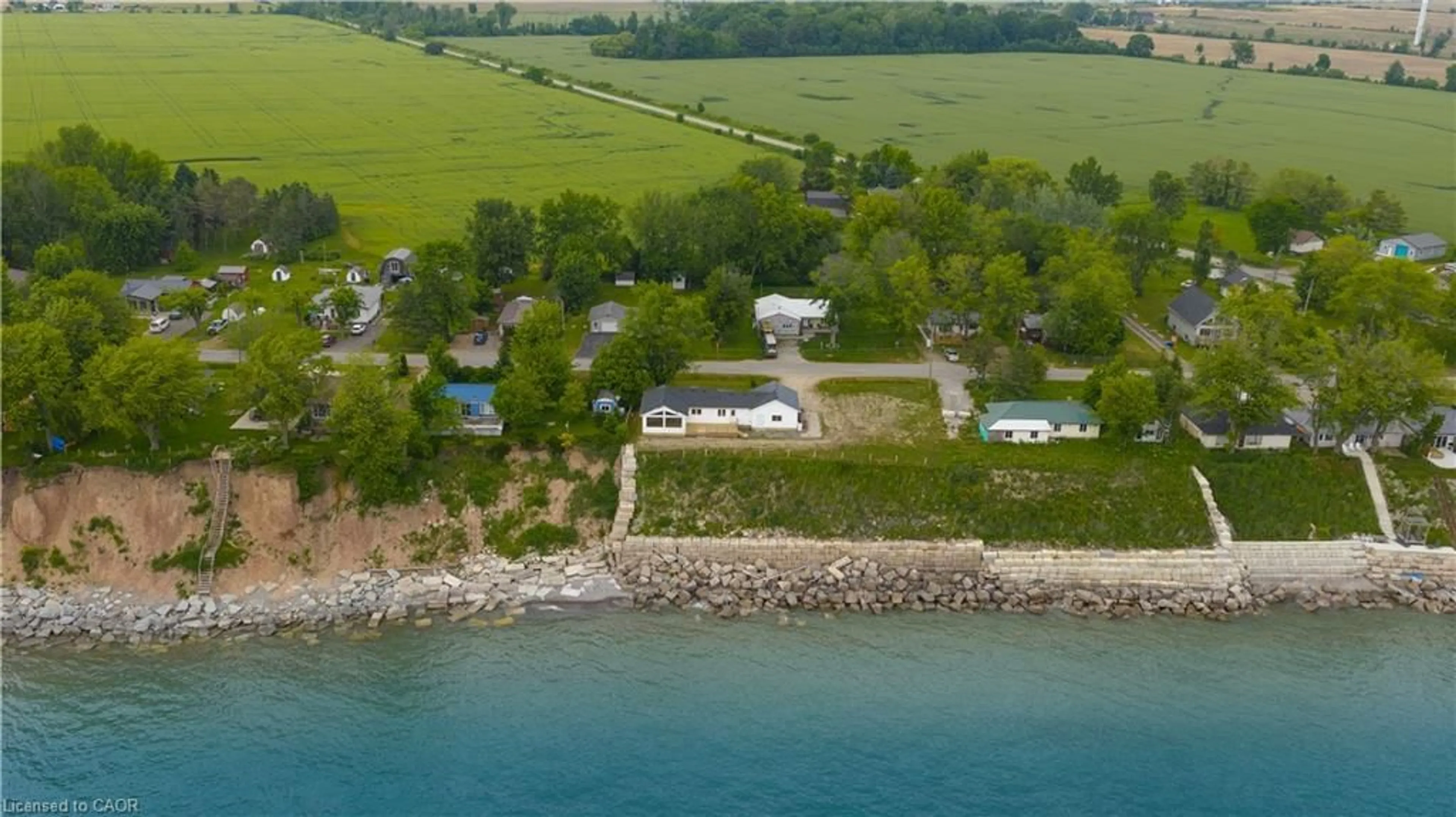 A pic from outside/outdoor area/front of a property/back of a property/a pic from drone, water/lake/river/ocean view for 21 Villella Rd, Dunnville Ontario N0A 1K0
