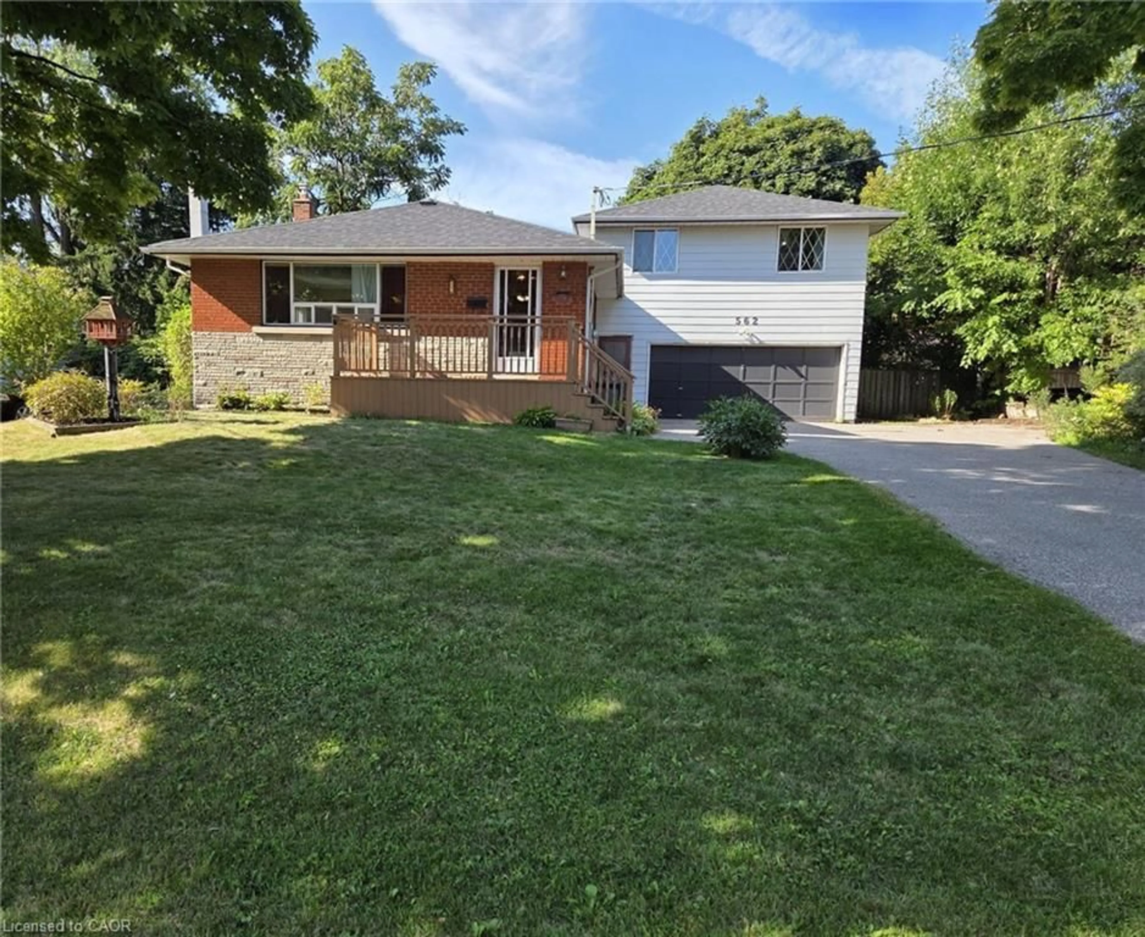 Home with brick exterior material, street for 562 Wellington Cres, Oakville Ontario L6L 4X5