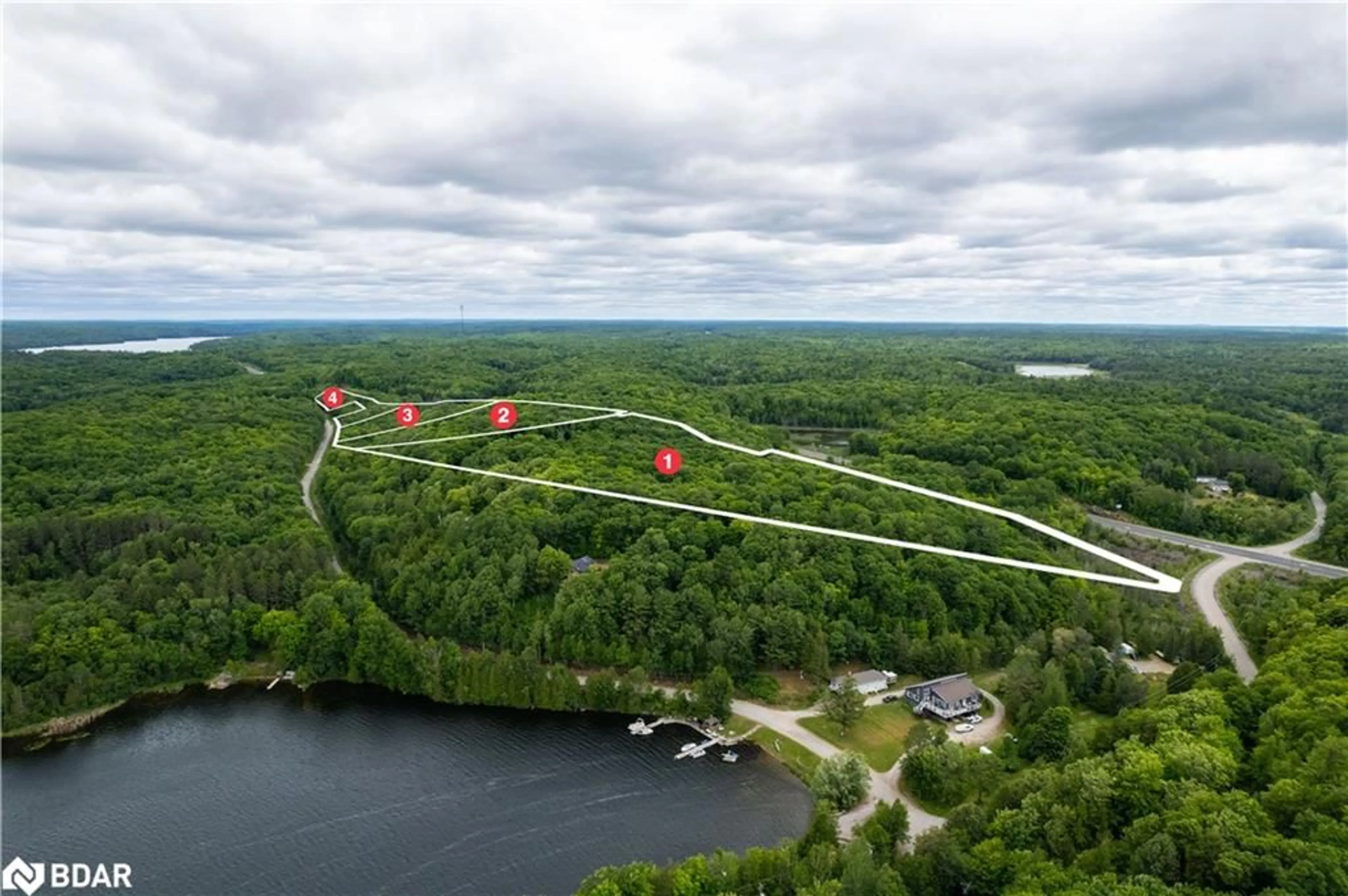 A pic from outside/outdoor area/front of a property/back of a property/a pic from drone, water/lake/river/ocean view for LOT 1 35 Hwy, Minden Ontario K0M 2L1