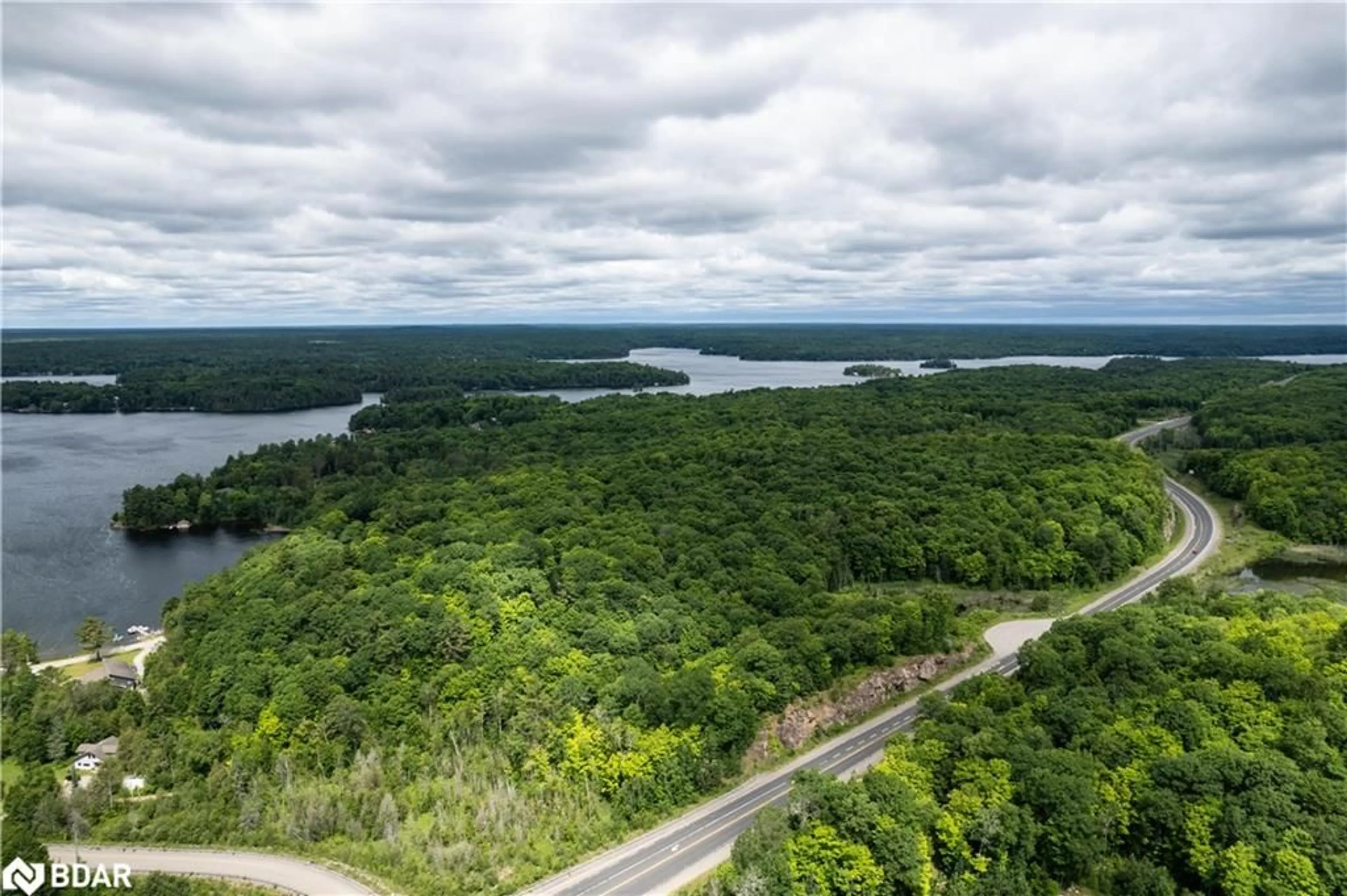 A pic from outside/outdoor area/front of a property/back of a property/a pic from drone, water/lake/river/ocean view for LOT 1 35 Hwy, Minden Ontario K0M 2L1