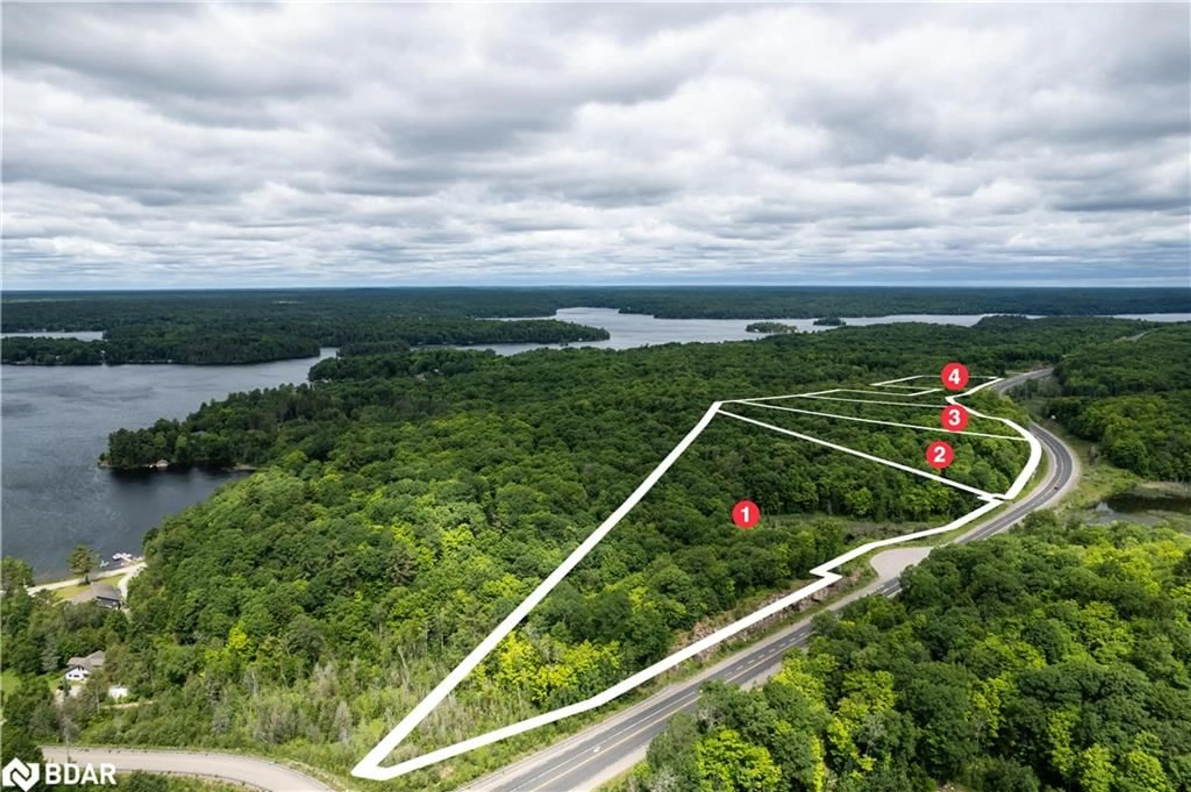 A pic from outside/outdoor area/front of a property/back of a property/a pic from drone, water/lake/river/ocean view for LOT 1 35 Hwy, Minden Ontario K0M 2L1