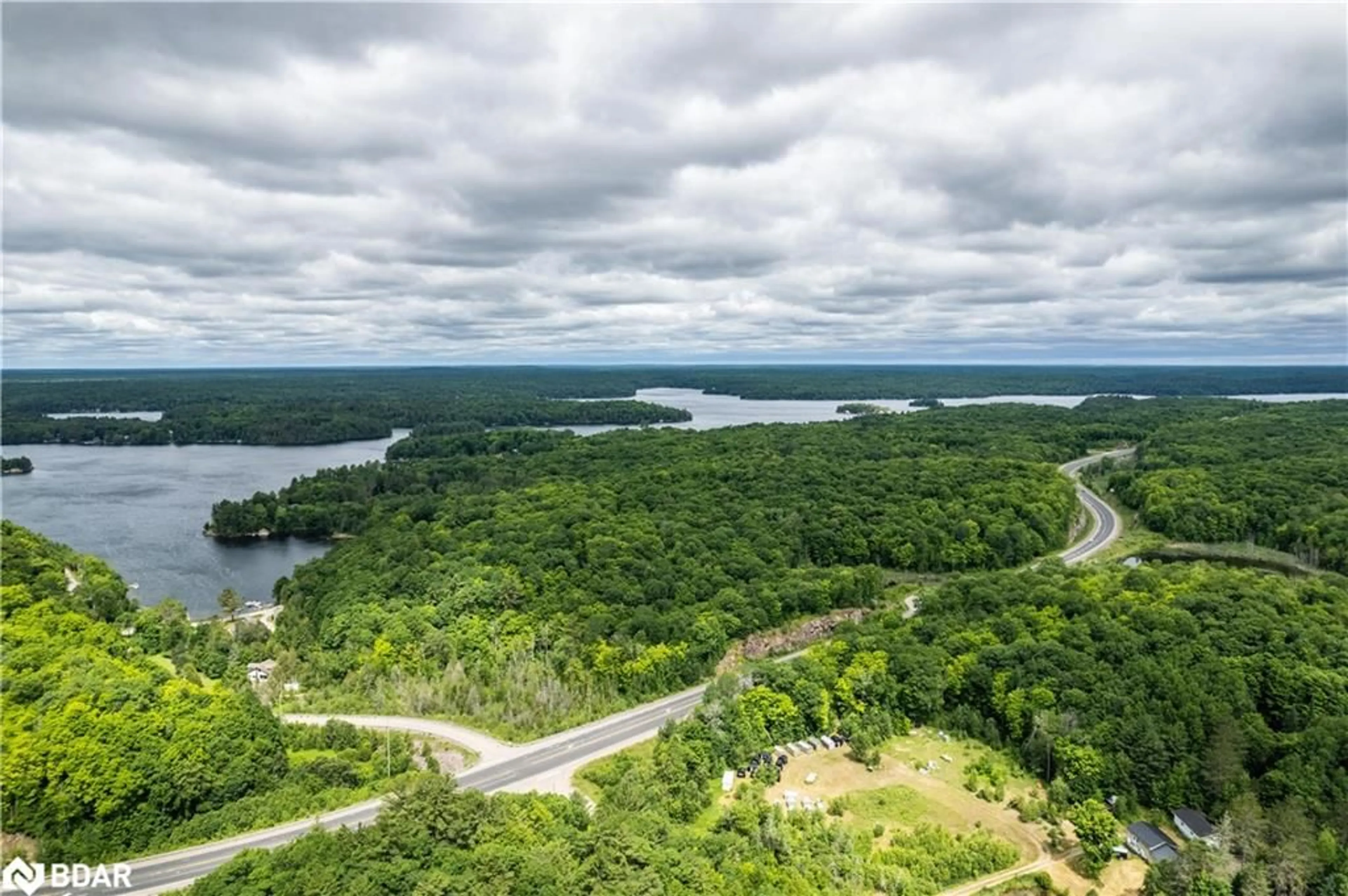 A pic from outside/outdoor area/front of a property/back of a property/a pic from drone, water/lake/river/ocean view for LOT 1 35 Hwy, Minden Ontario K0M 2L1