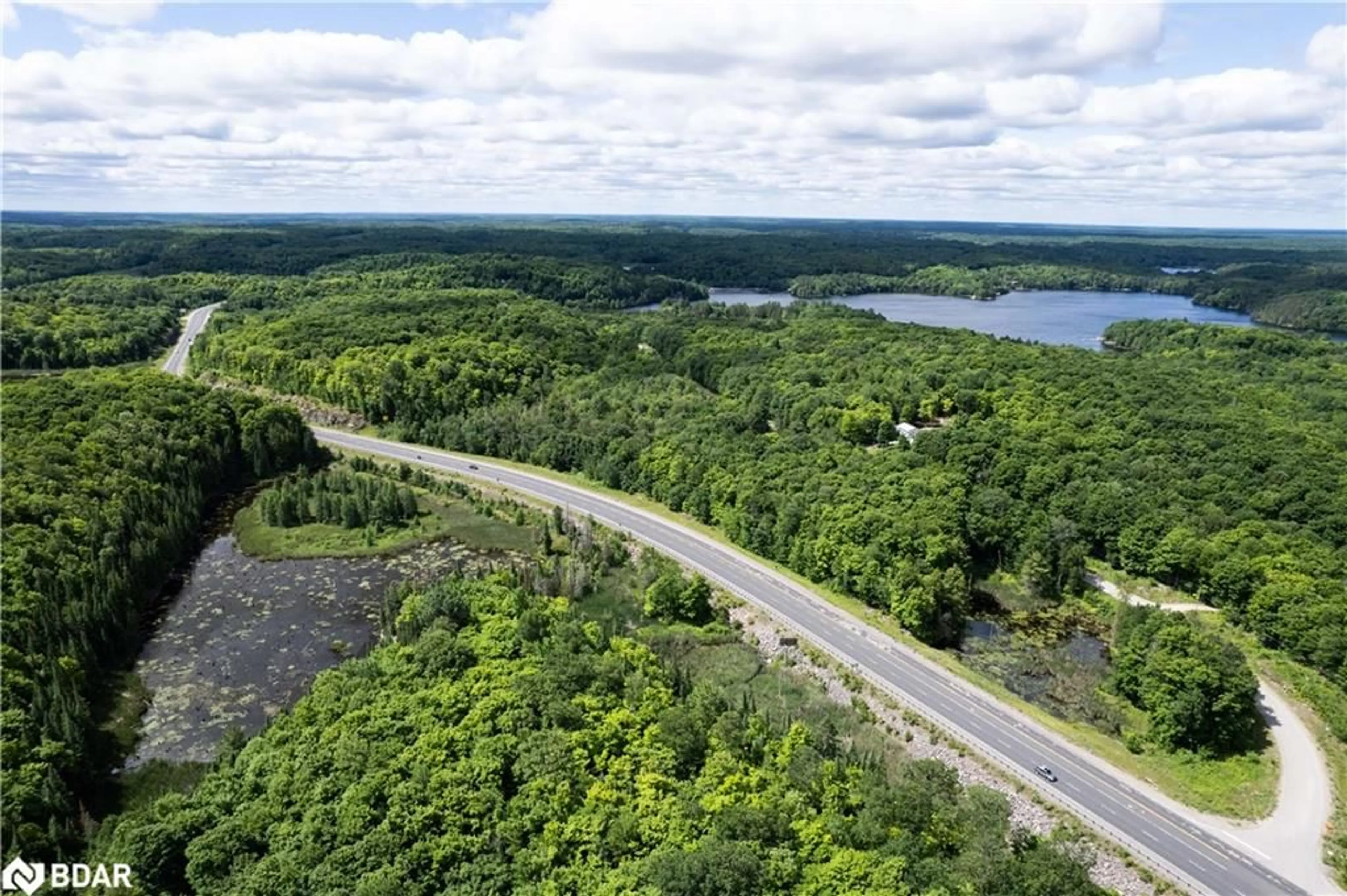 A pic from outside/outdoor area/front of a property/back of a property/a pic from drone, water/lake/river/ocean view for LOT 2 35 Hwy, Minden Ontario K0M 2L1